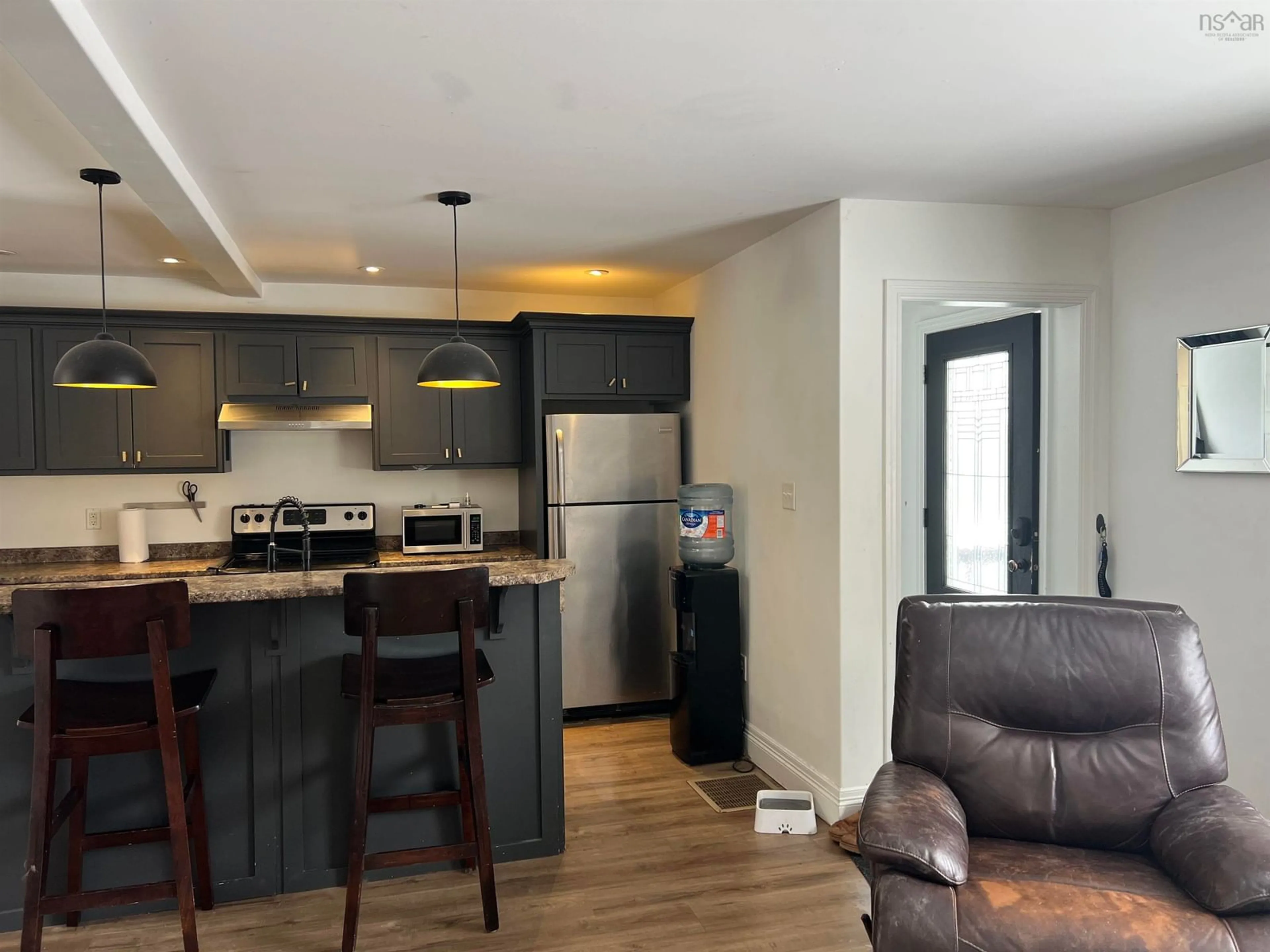 Open concept kitchen, wood/laminate floor for 274 Pleasant St, Truro Nova Scotia B2N 3T1