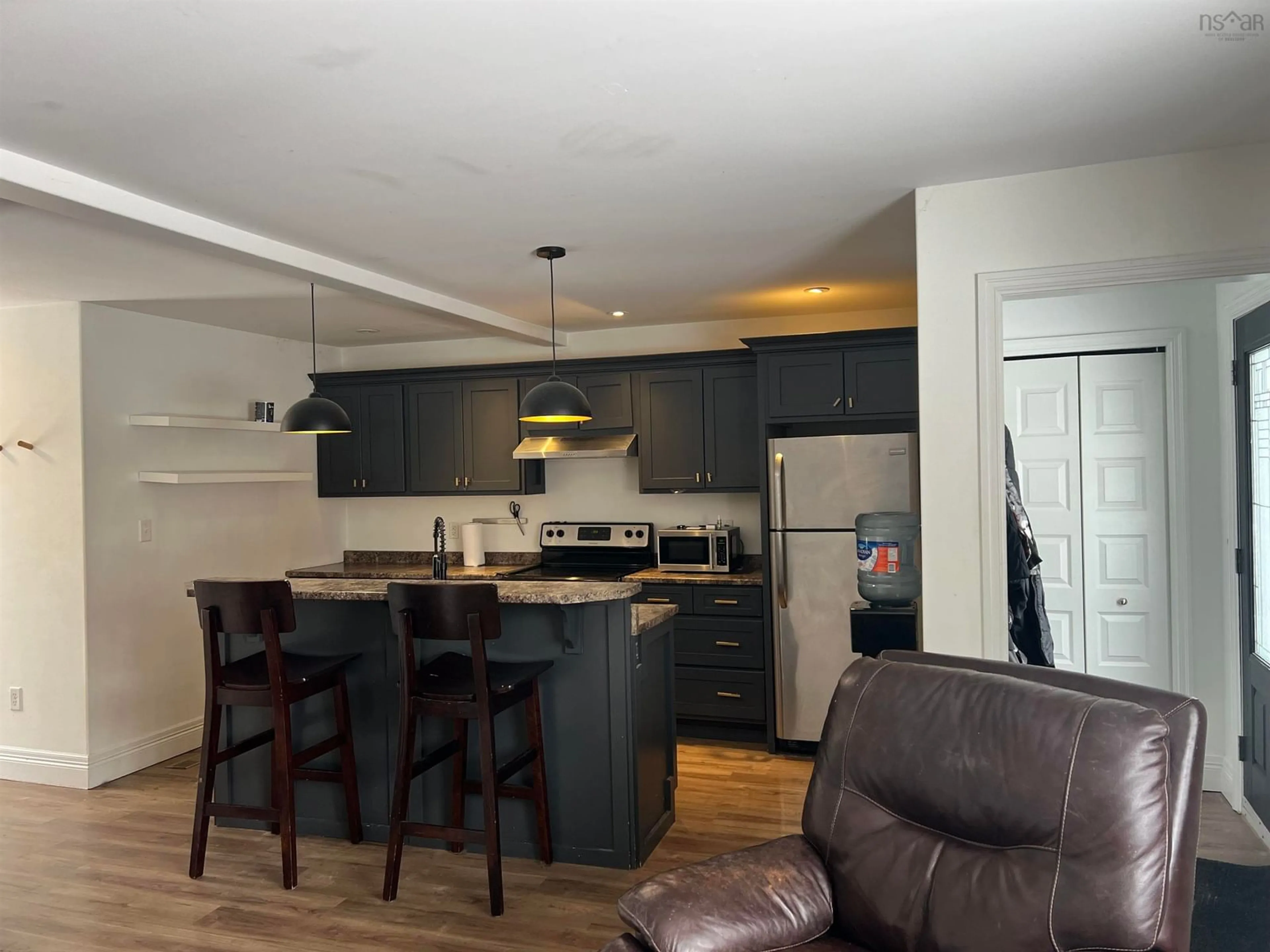 Open concept kitchen, wood/laminate floor for 274 Pleasant St, Truro Nova Scotia B2N 3T1