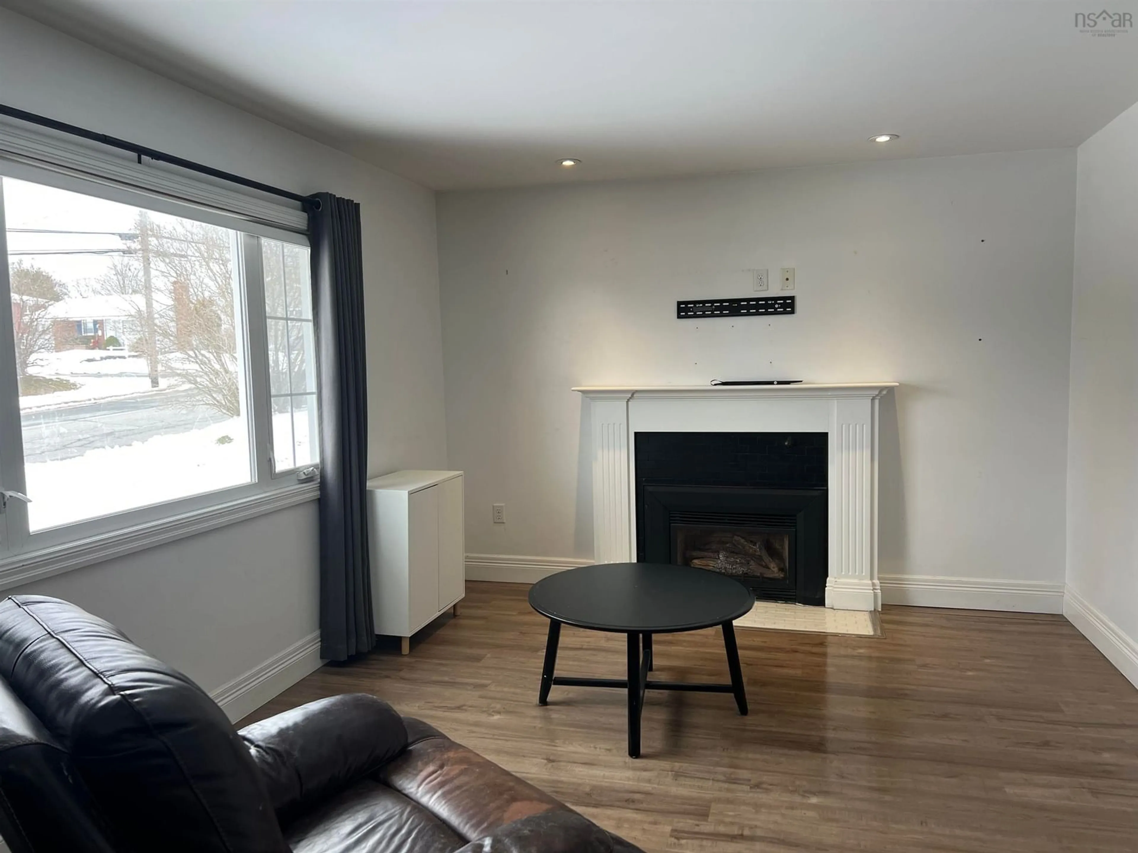 Living room with furniture, wood/laminate floor for 274 Pleasant St, Truro Nova Scotia B2N 3T1