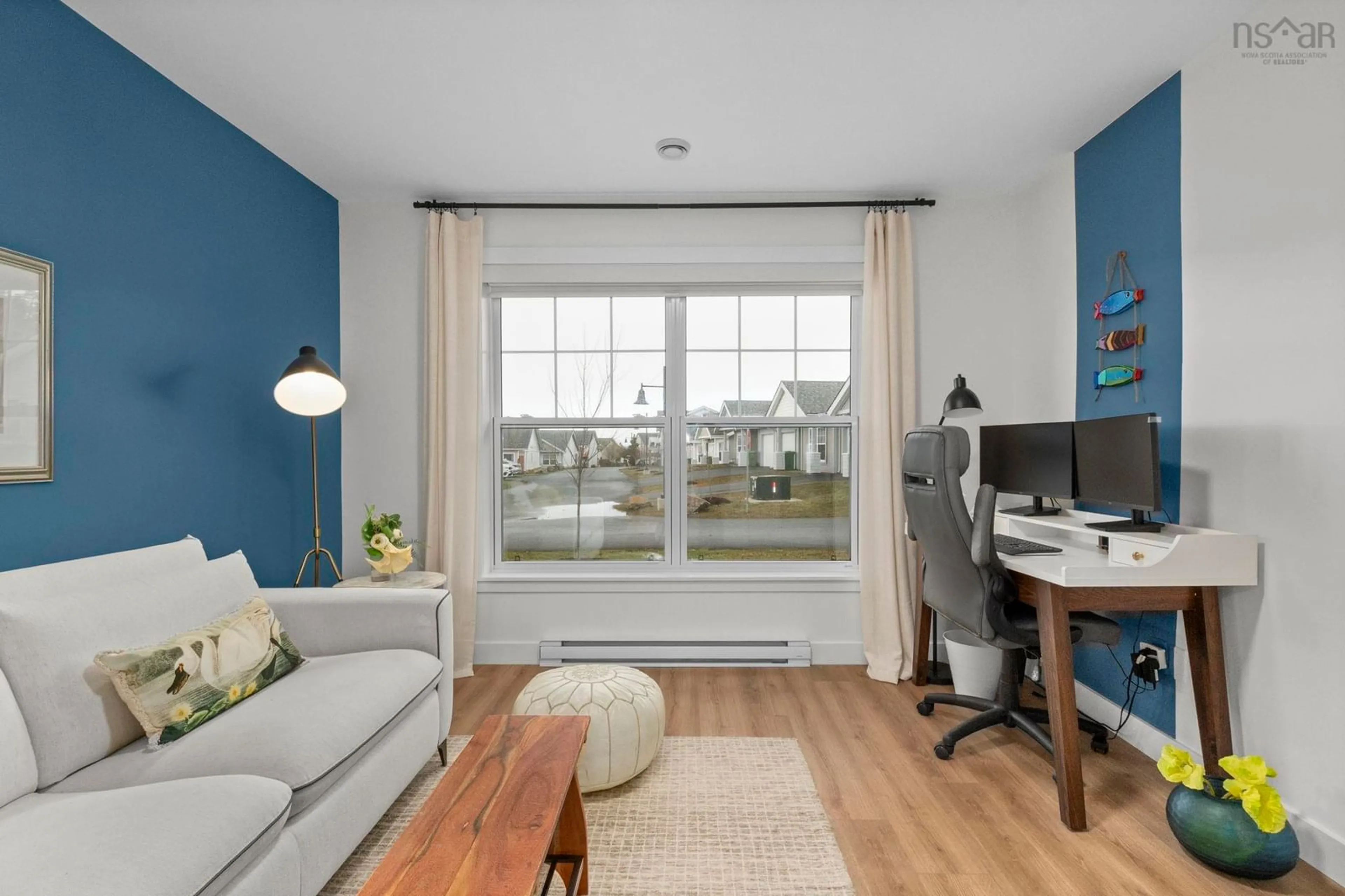 Living room with furniture, wood/laminate floor for 3 Moonlit Ridge, Eastern Passage Nova Scotia B3G 0H5