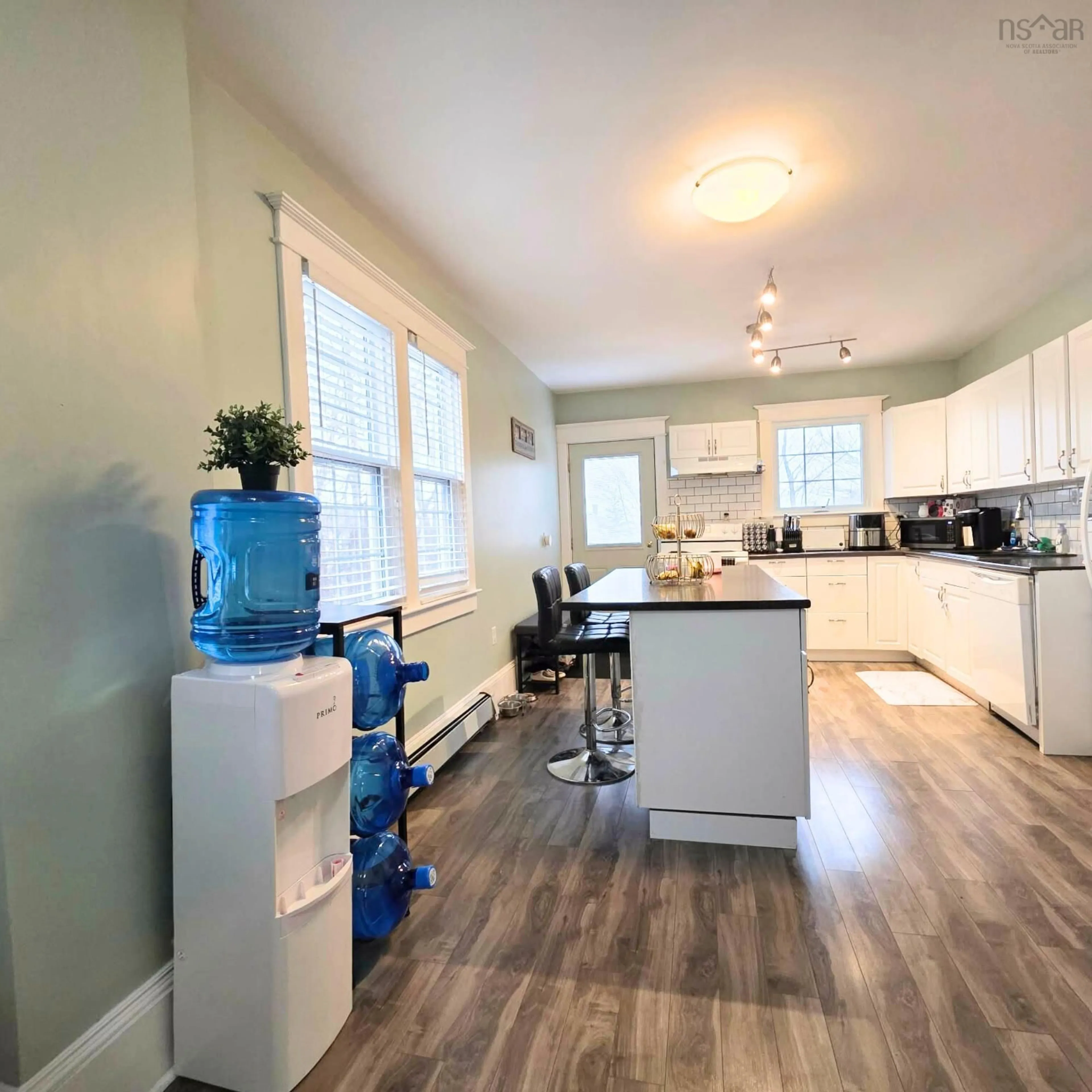 Open concept kitchen, wood/laminate floor for 120 Cornishtown Rd, Sydney Nova Scotia B1Y 2Y2