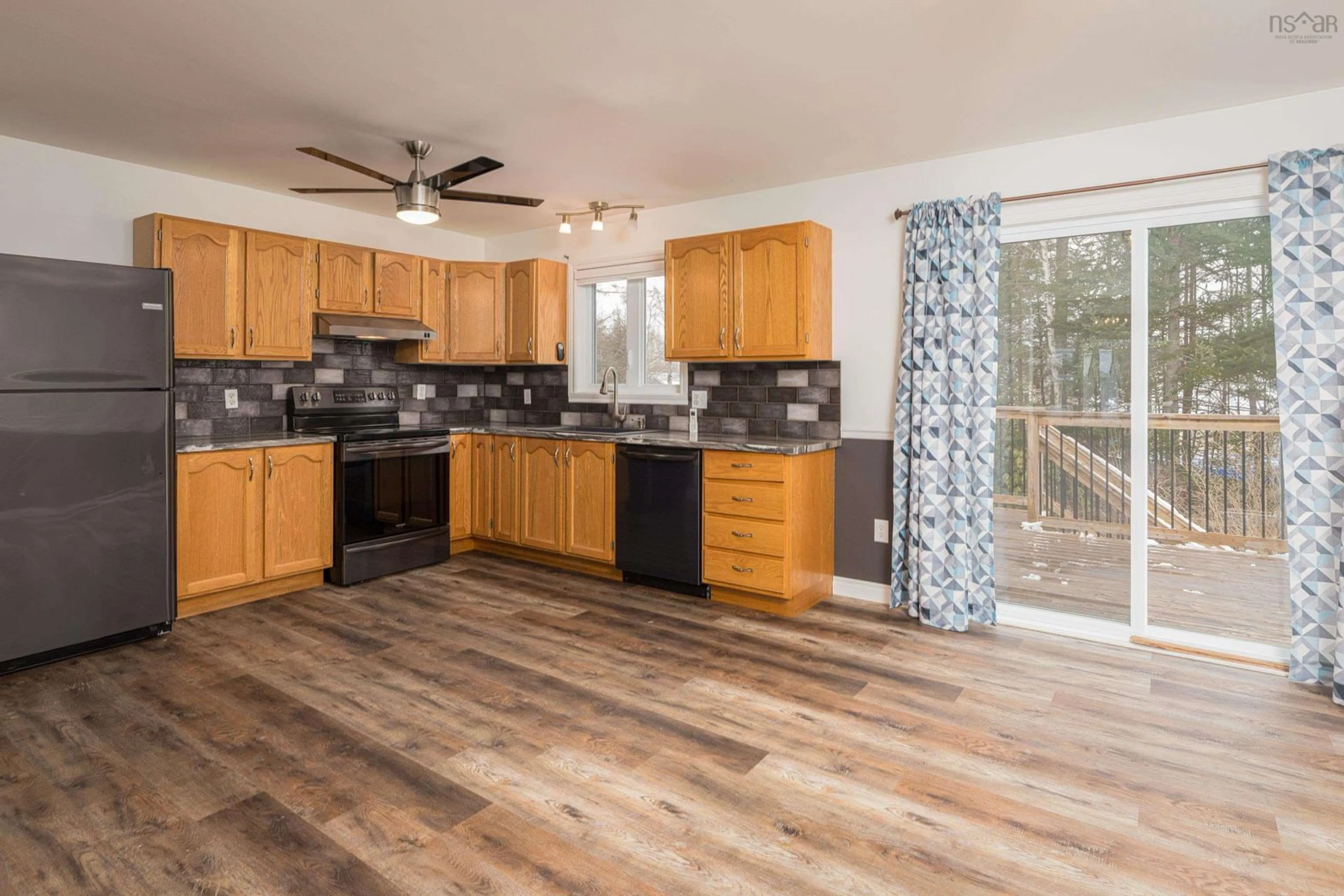 Open concept kitchen, wood/laminate floor for 3 Hemlock Dr, Elmsdale Nova Scotia B2S 1B6