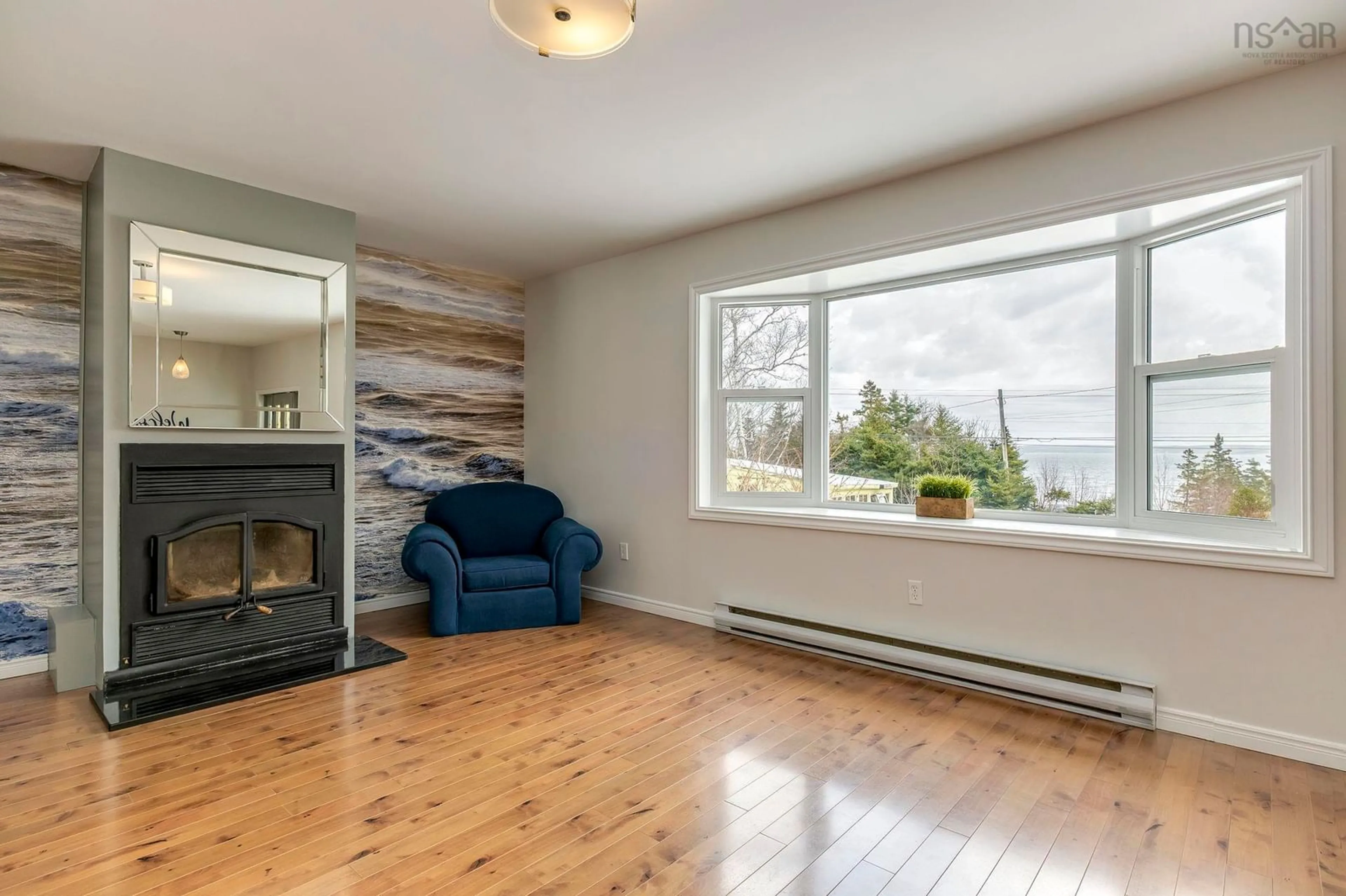 Living room with furniture, wood/laminate floor for 2208 Highway 329, The Lodge Nova Scotia B0J 1T0