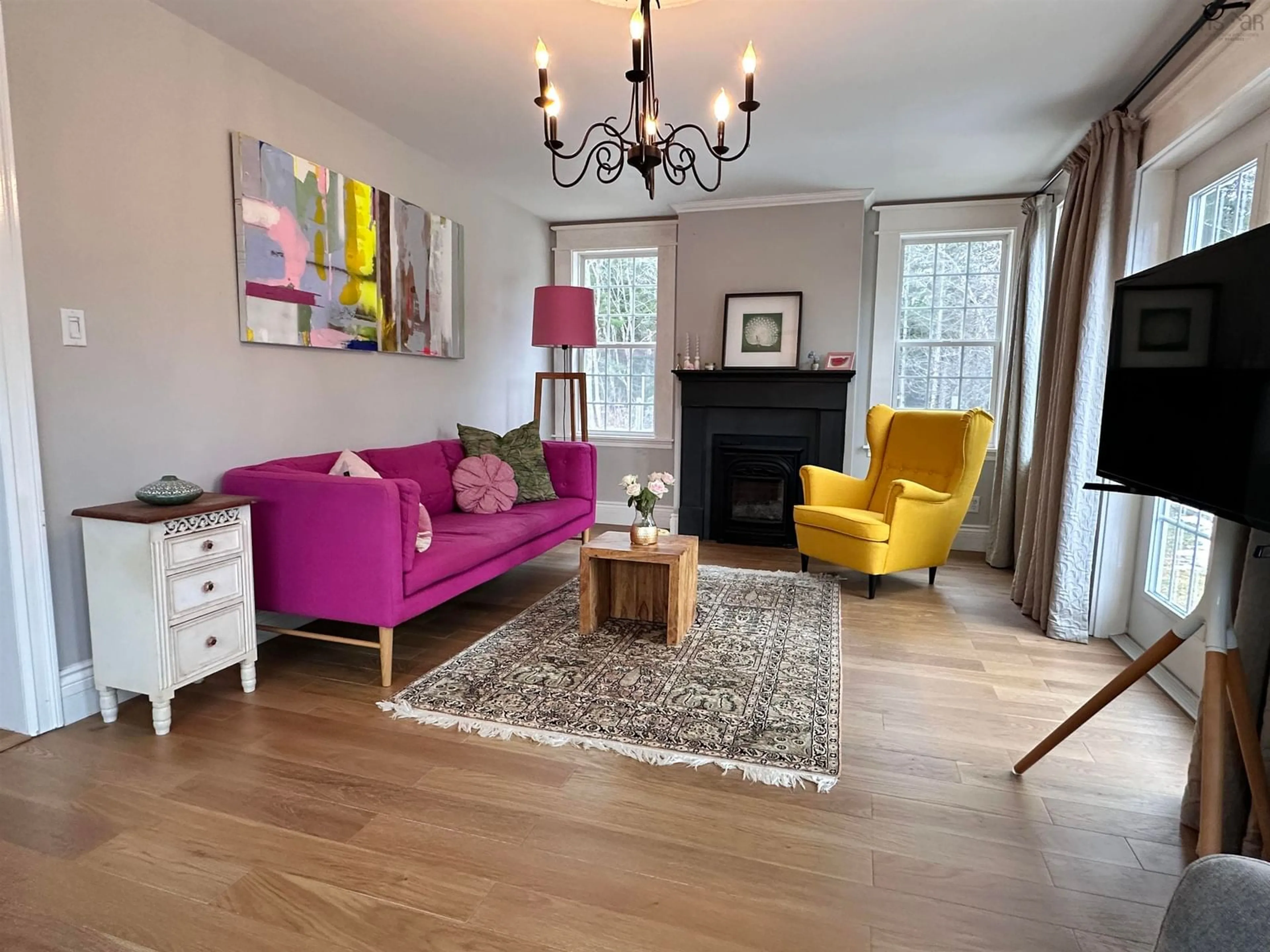 Living room with furniture, wood/laminate floor for 151 Medway River Rd, Mill Village Nova Scotia B0J 2H0