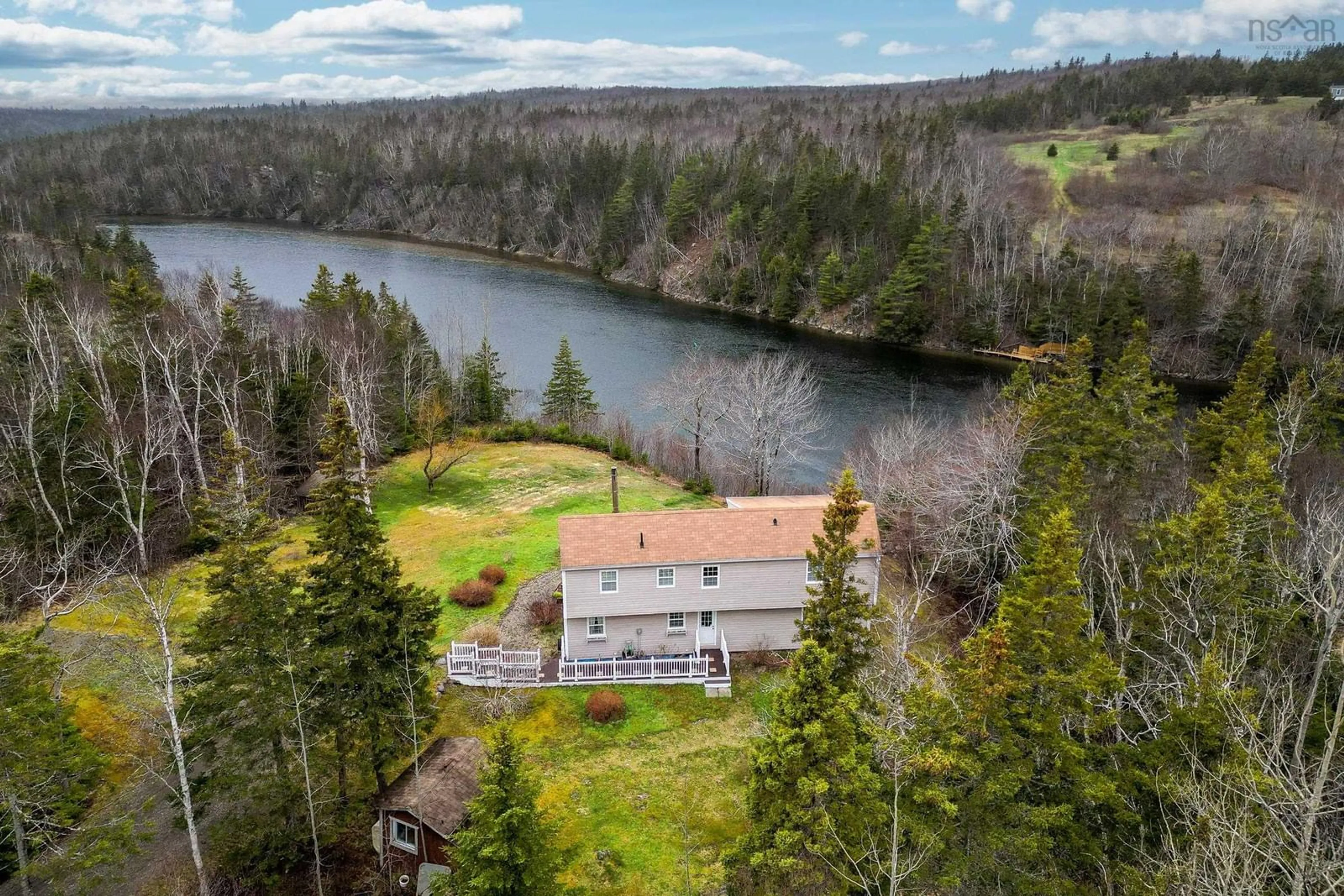 A pic from outside/outdoor area/front of a property/back of a property/a pic from drone, water/lake/river/ocean view for 1405 Brickyard Road, Mira Nova Scotia B1K 2V6