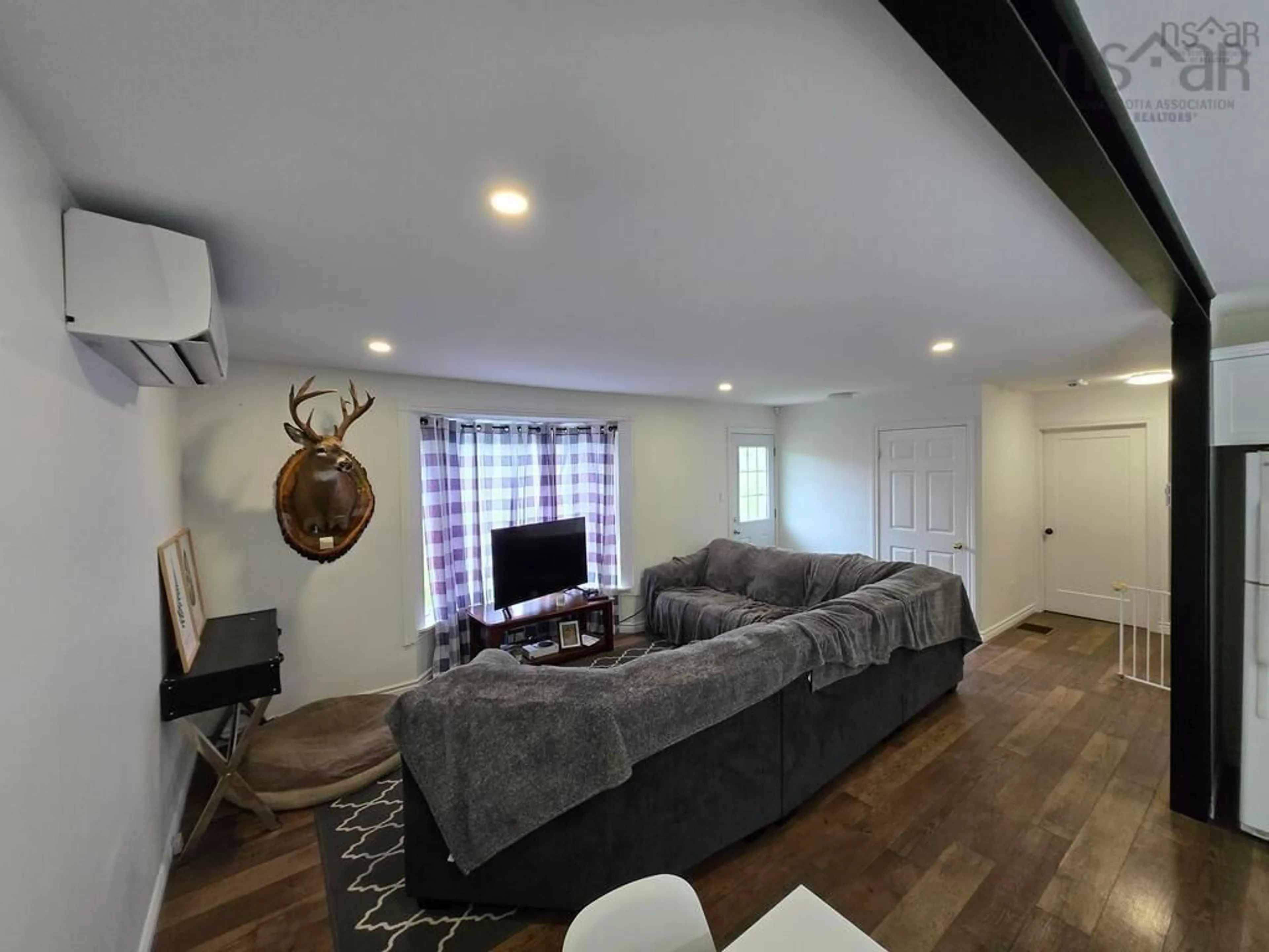 Living room with furniture, unknown for 8500 Sherbrooke Rd, Mcphersons Mills Nova Scotia B0K 1W0