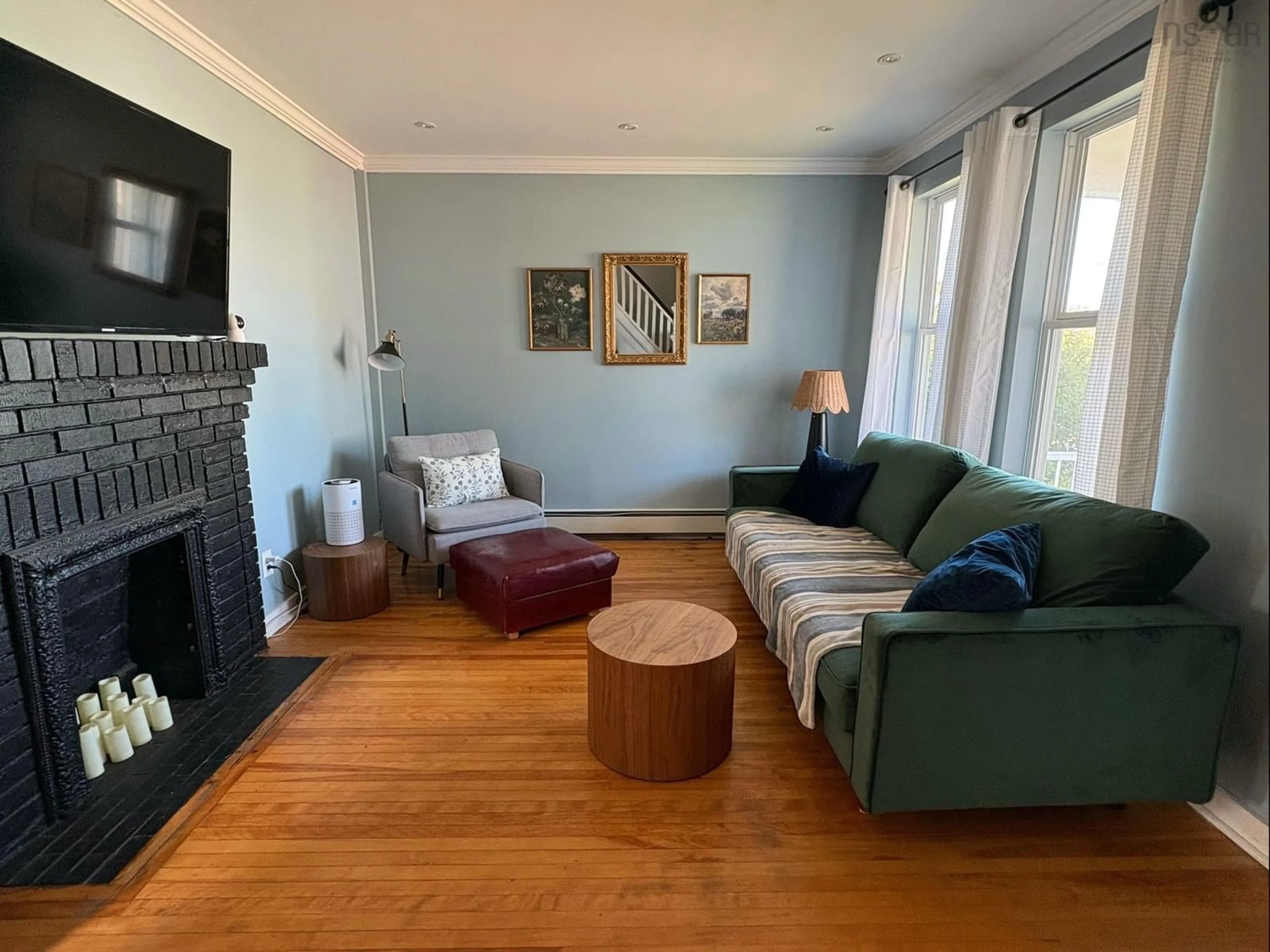 Living room with furniture, wood/laminate floor for 137 Alexander St, Glace Bay Nova Scotia B1A 4A6