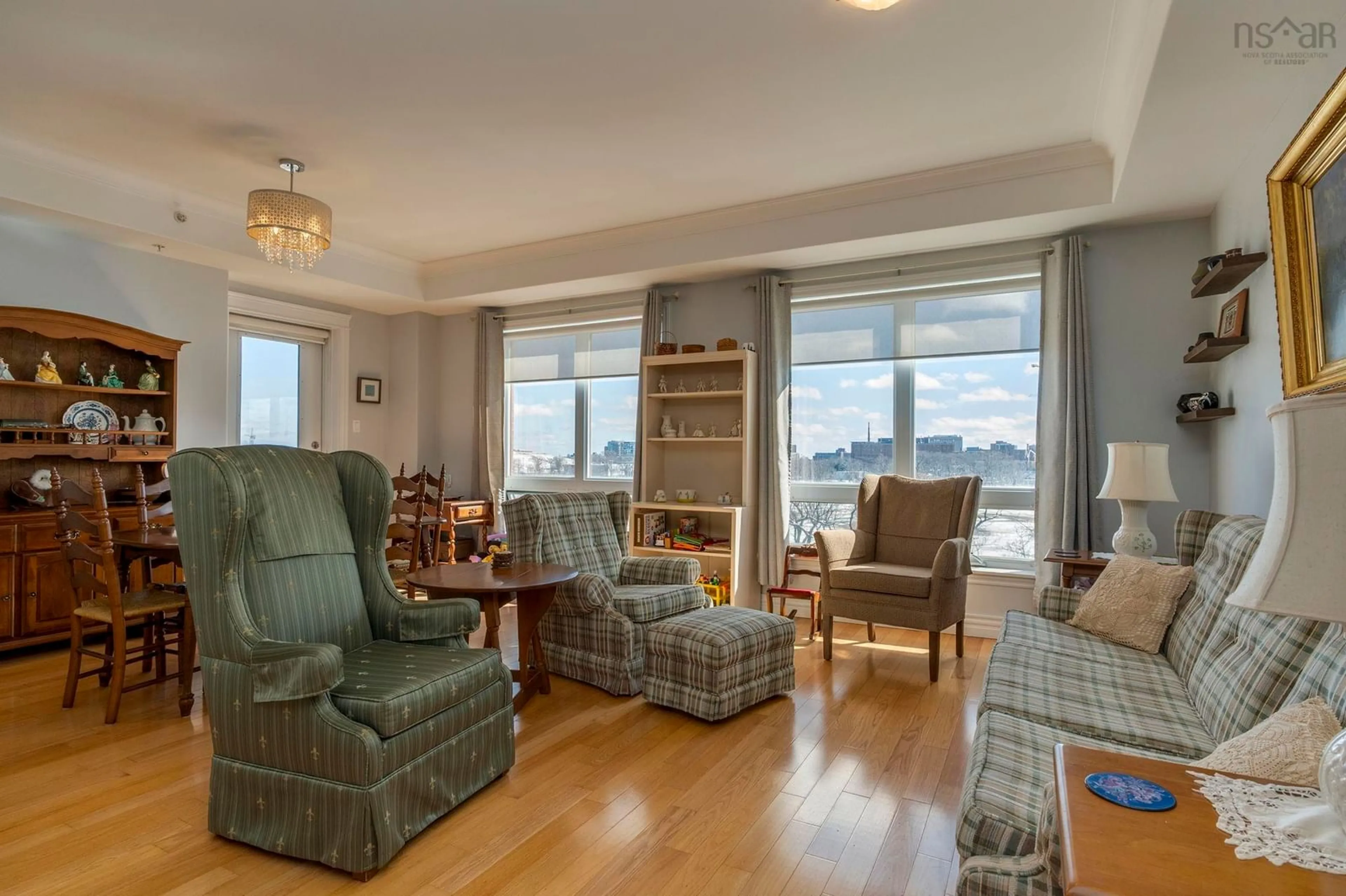 Living room with furniture, wood/laminate floor for 5839 Cunard St #502, Halifax Nova Scotia B3K 0B9