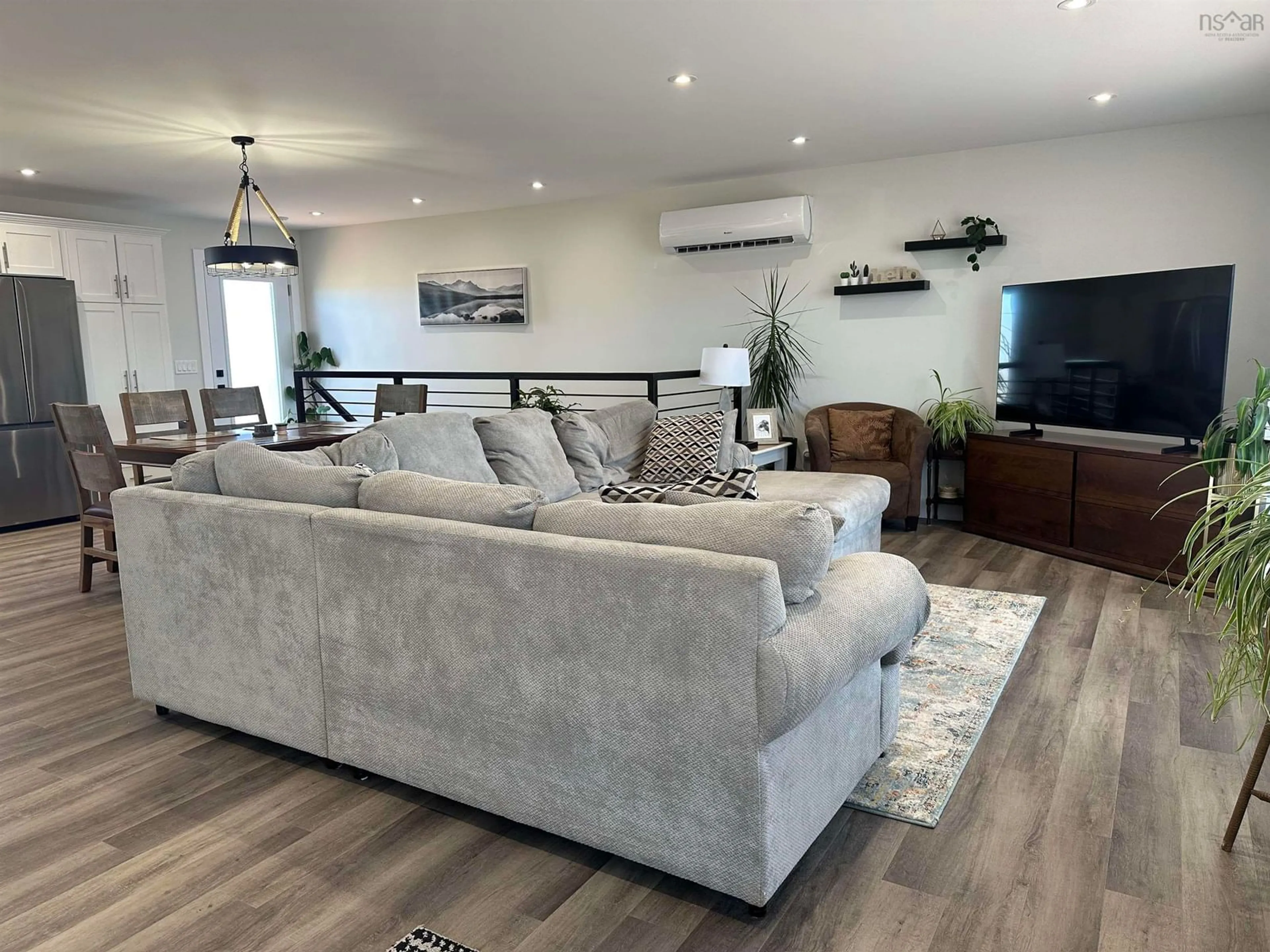 Living room with furniture, wood/laminate floor for 28 Holland Lane, Plymouth Nova Scotia B2H 5C5