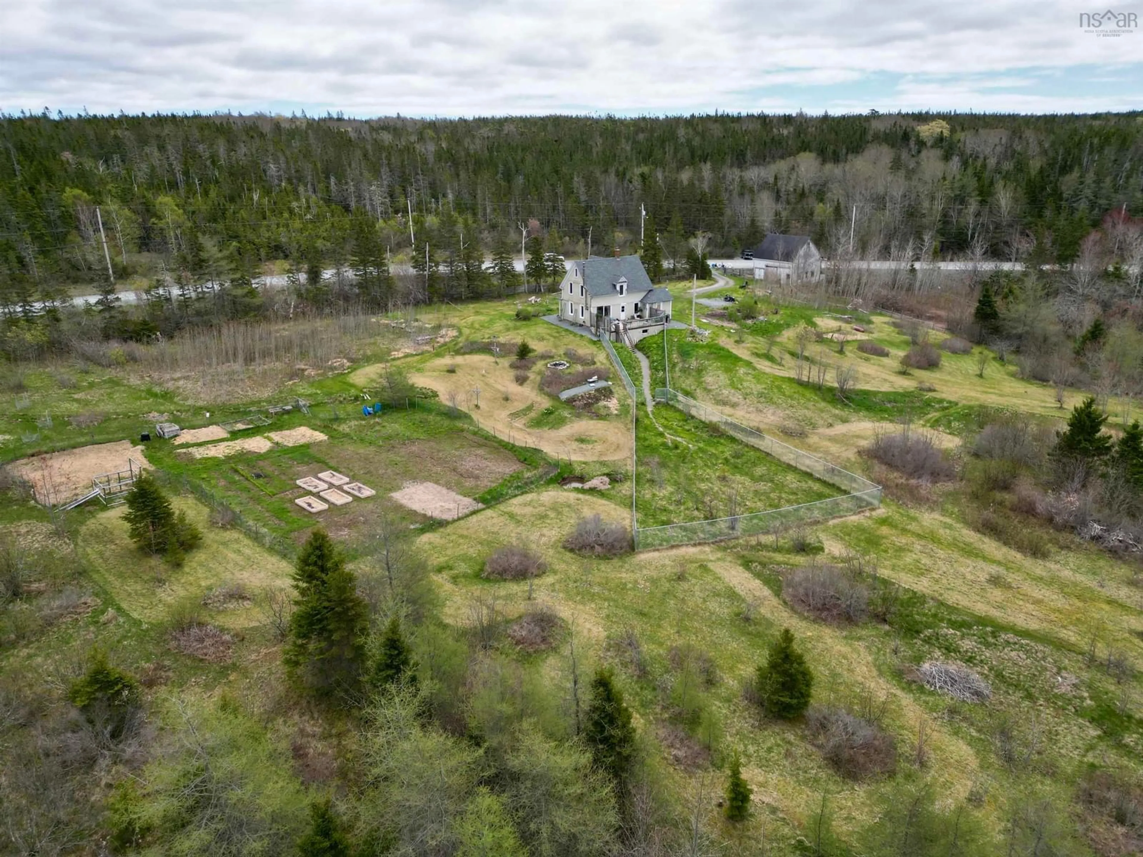 A pic from outside/outdoor area/front of a property/back of a property/a pic from drone, forest/trees view for 3463 Loch Lomond Rd., Loch Lomond Nova Scotia B2E 1C5