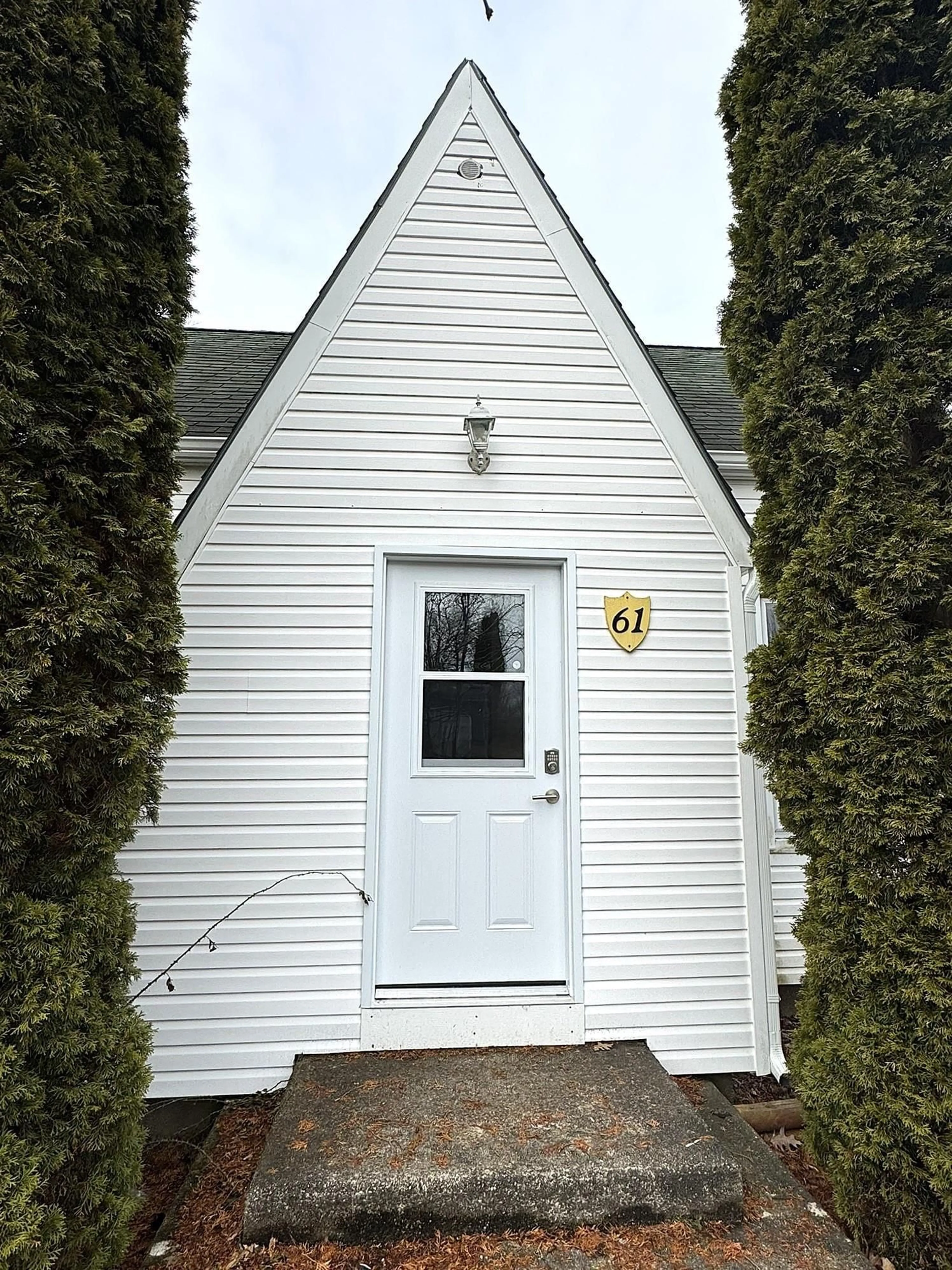 Home with vinyl exterior material, street for 61 Lawrencetown Lane, Lawrencetown Nova Scotia B0S 1M0