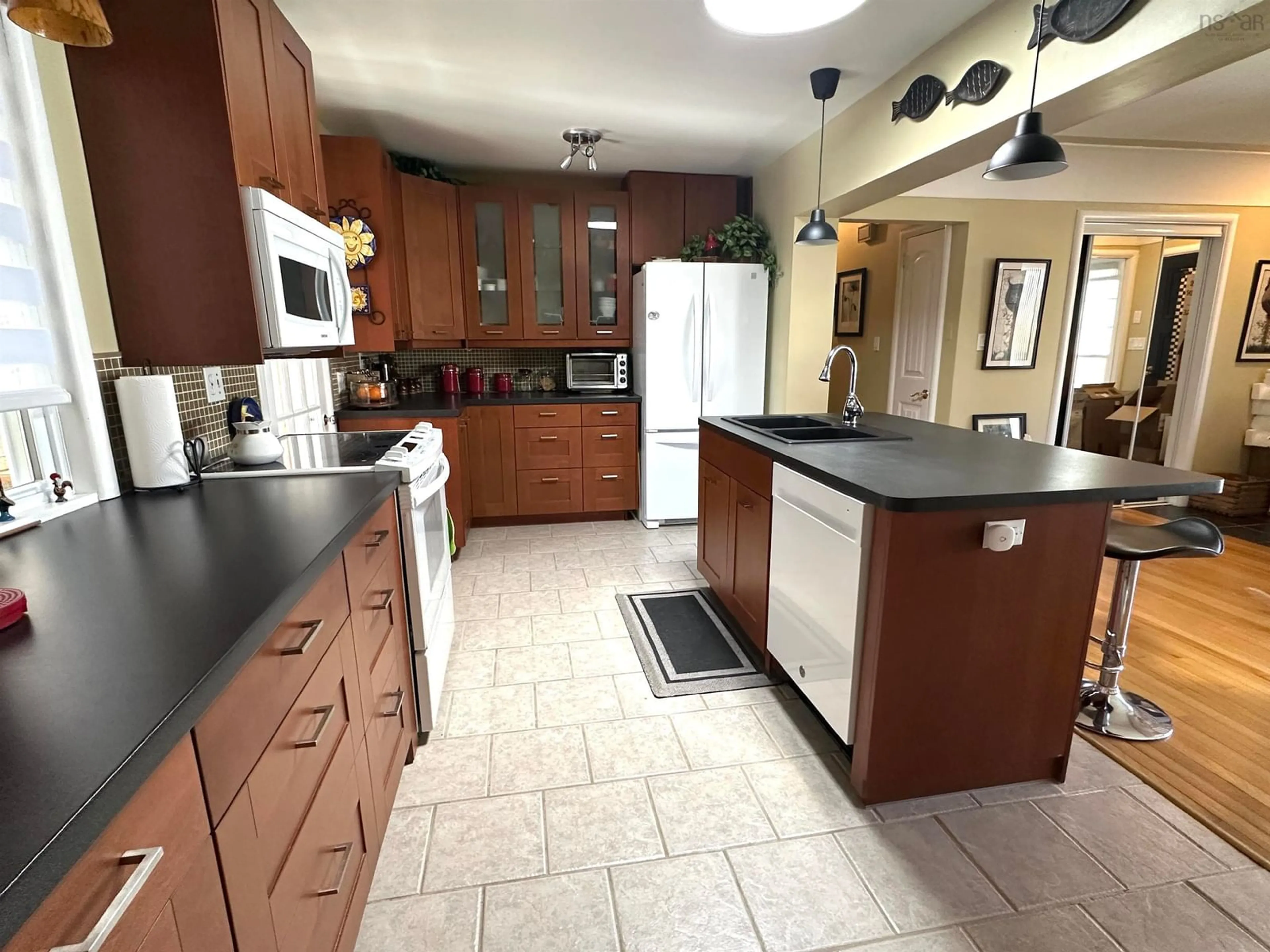 Open concept kitchen, ceramic/tile floor for 20 Boehner St, Liverpool Nova Scotia B0T 1K0