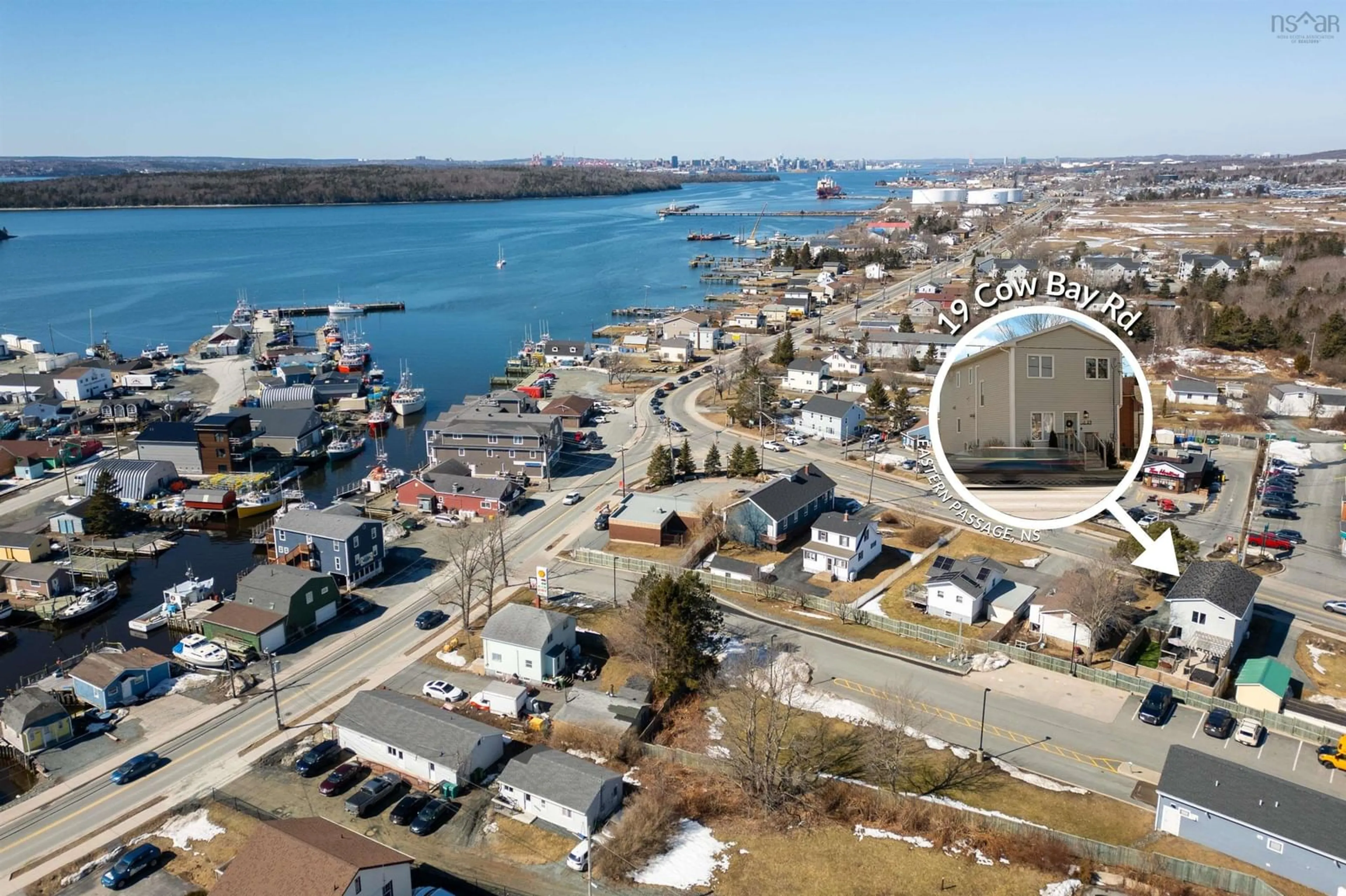 A pic from outside/outdoor area/front of a property/back of a property/a pic from drone, water/lake/river/ocean view for 19 Cow Bay Rd, Eastern Passage Nova Scotia B3G 1M5