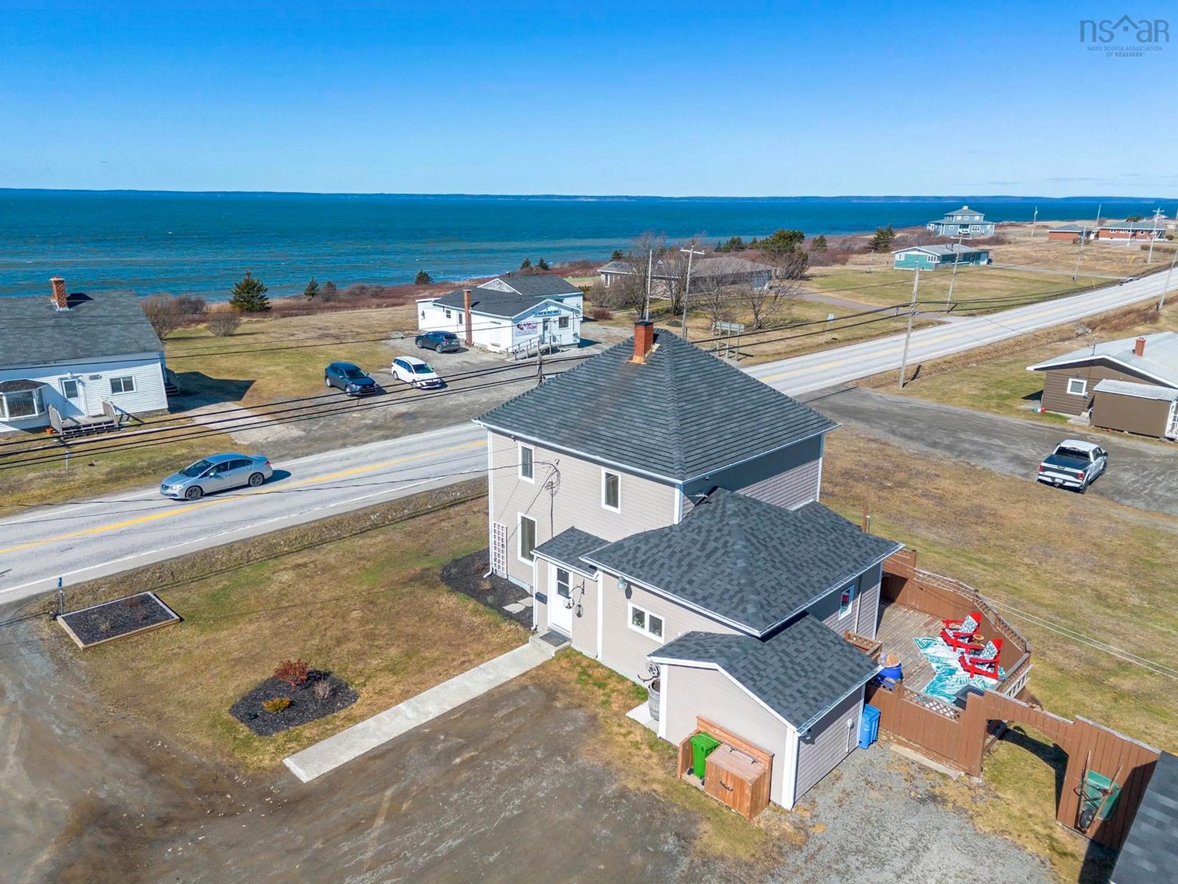 A pic from outside/outdoor area/front of a property/back of a property/a pic from drone, water/lake/river/ocean view for 10194 1 Hwy, Saulnierville Nova Scotia B0W 2Z0