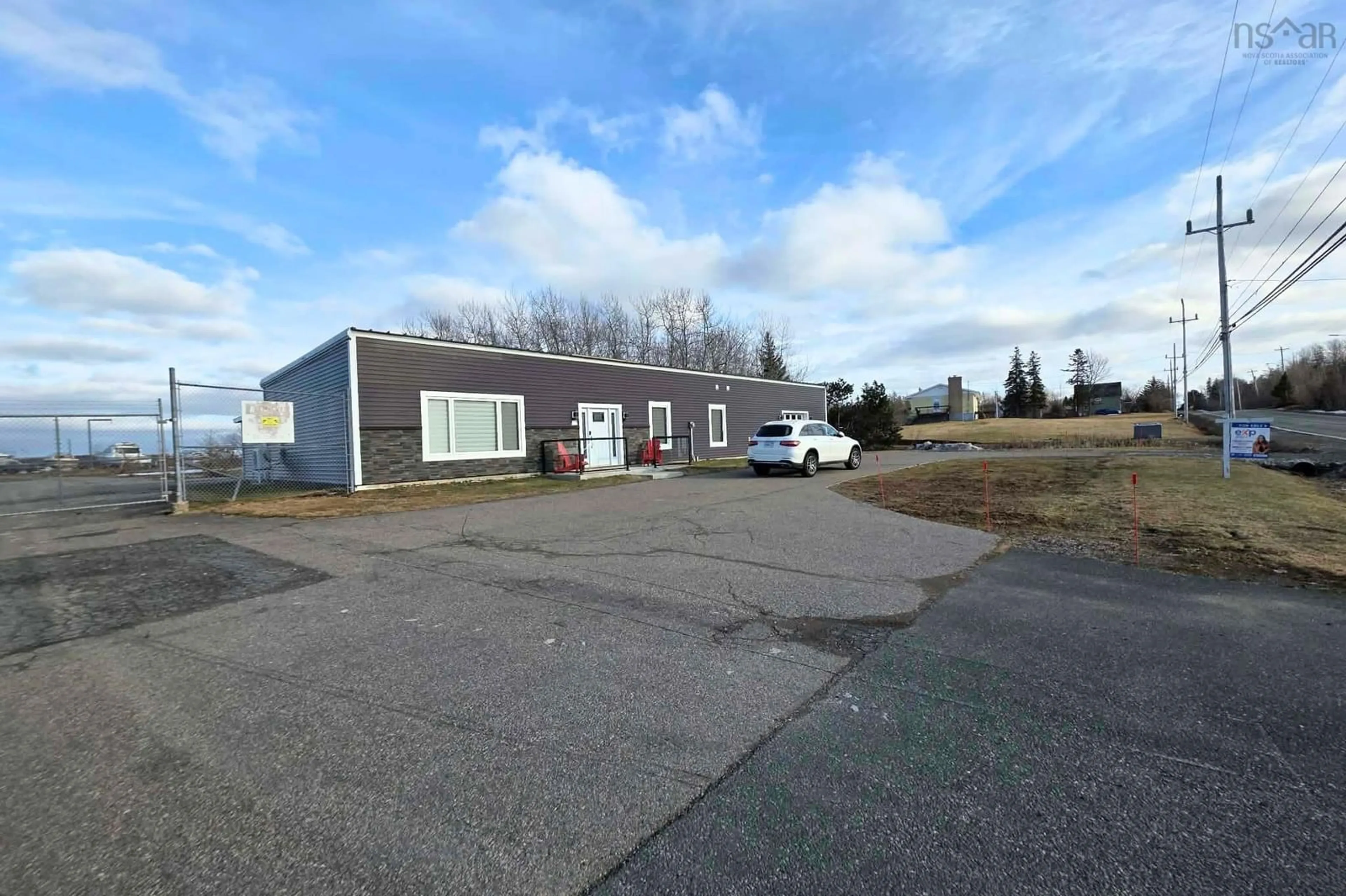 A pic from outside/outdoor area/front of a property/back of a property/a pic from drone, building for 1526 Keltic Dr, Leitches Creek Nova Scotia B2A 4Y1
