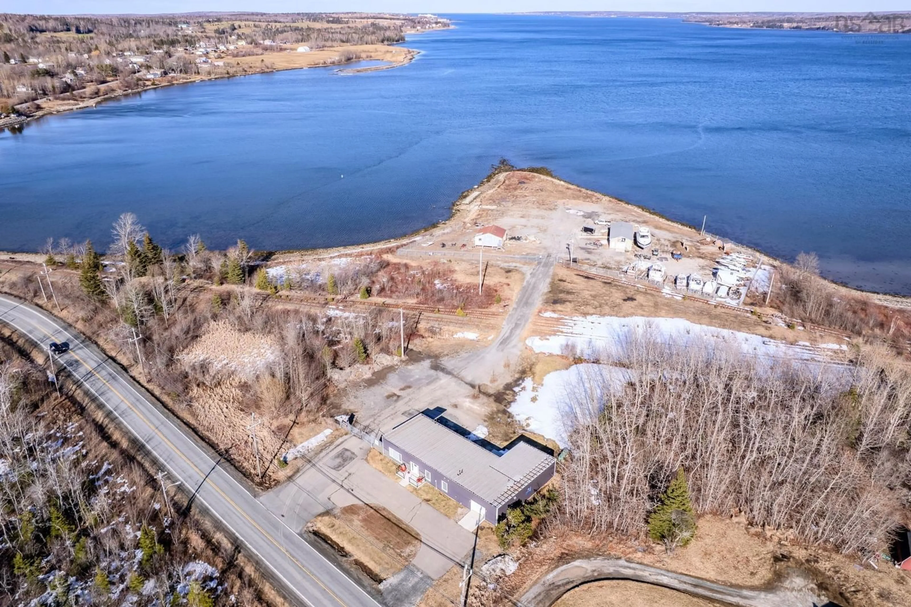 A pic from outside/outdoor area/front of a property/back of a property/a pic from drone, water/lake/river/ocean view for 1526 Keltic Dr, Leitches Creek Nova Scotia B2A 4Y1