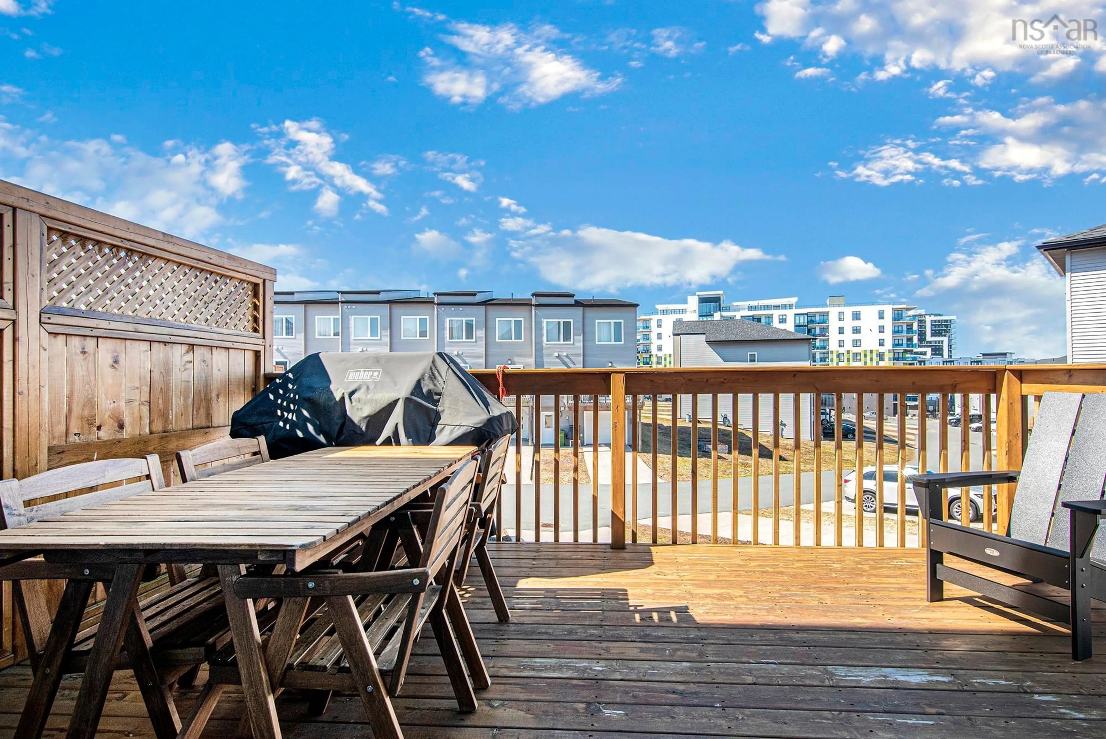 Patio, city buildings view from balcony for 84 Eliza Ritchie Cres, Bedford Nova Scotia B3M 0K6