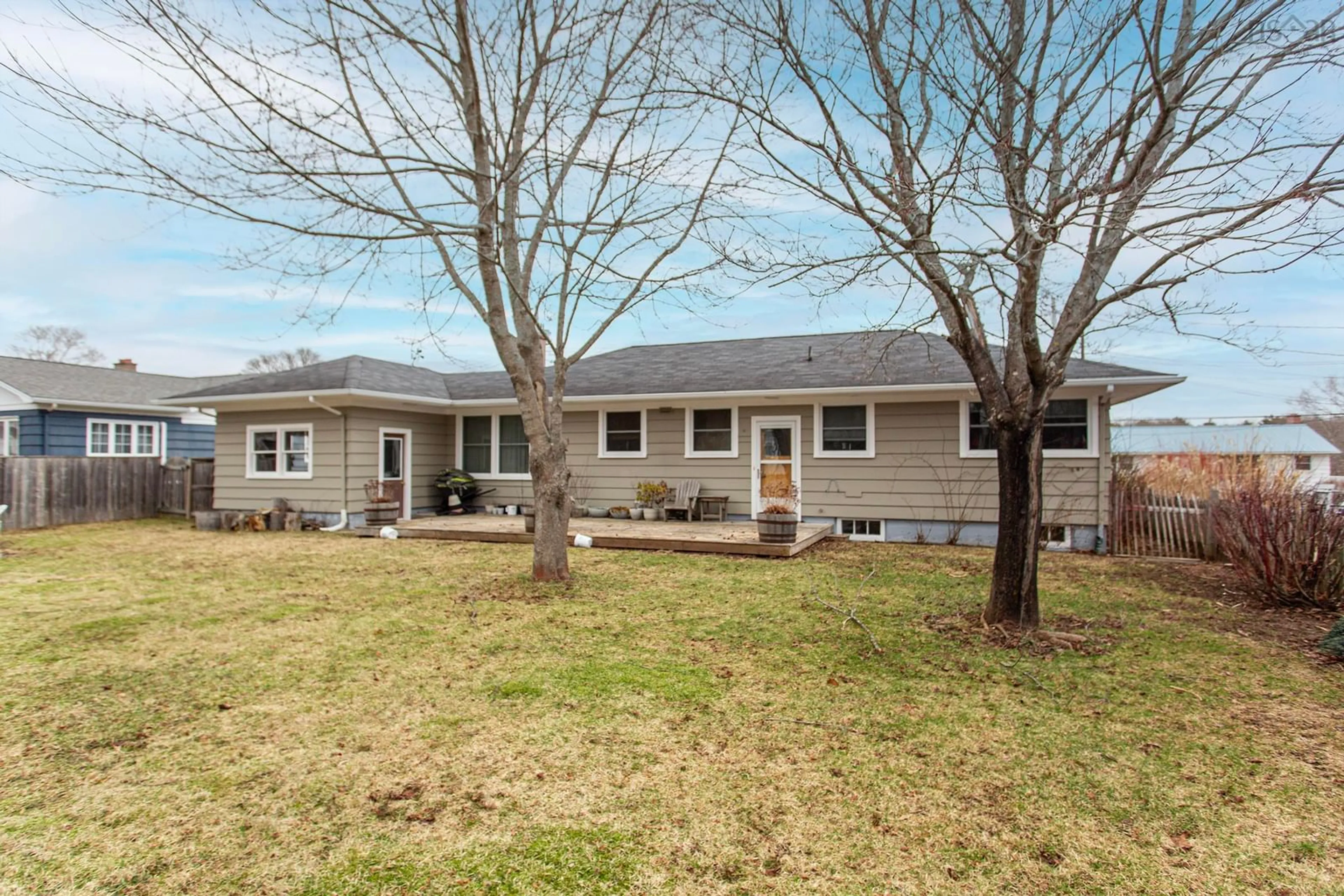 Home with vinyl exterior material, street for 5 Acadia St, Middleton Nova Scotia B0S 1P0