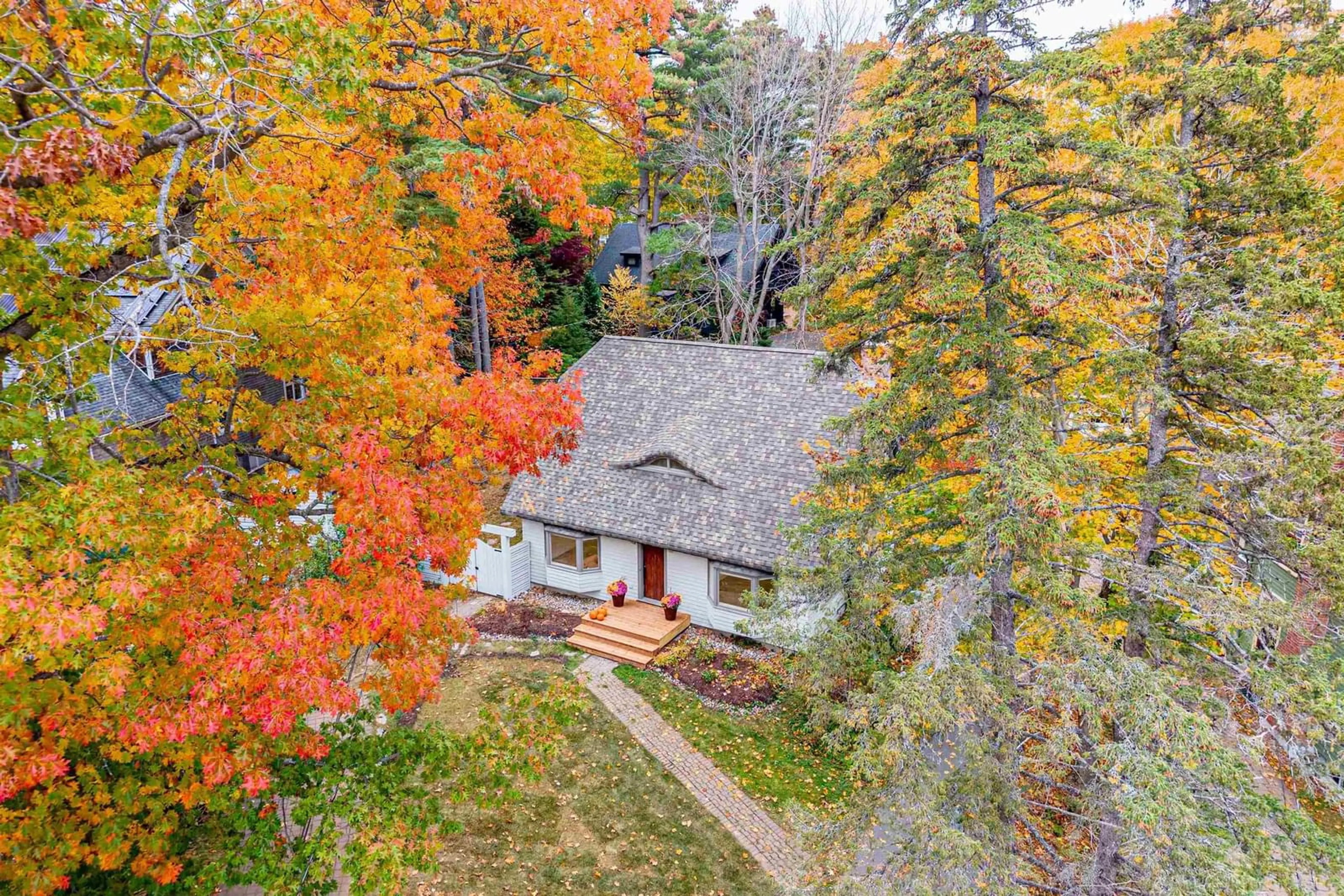 A pic from outside/outdoor area/front of a property/back of a property/a pic from drone, forest/trees view for 680 Shore Dr, Bedford Nova Scotia B4A 2E1