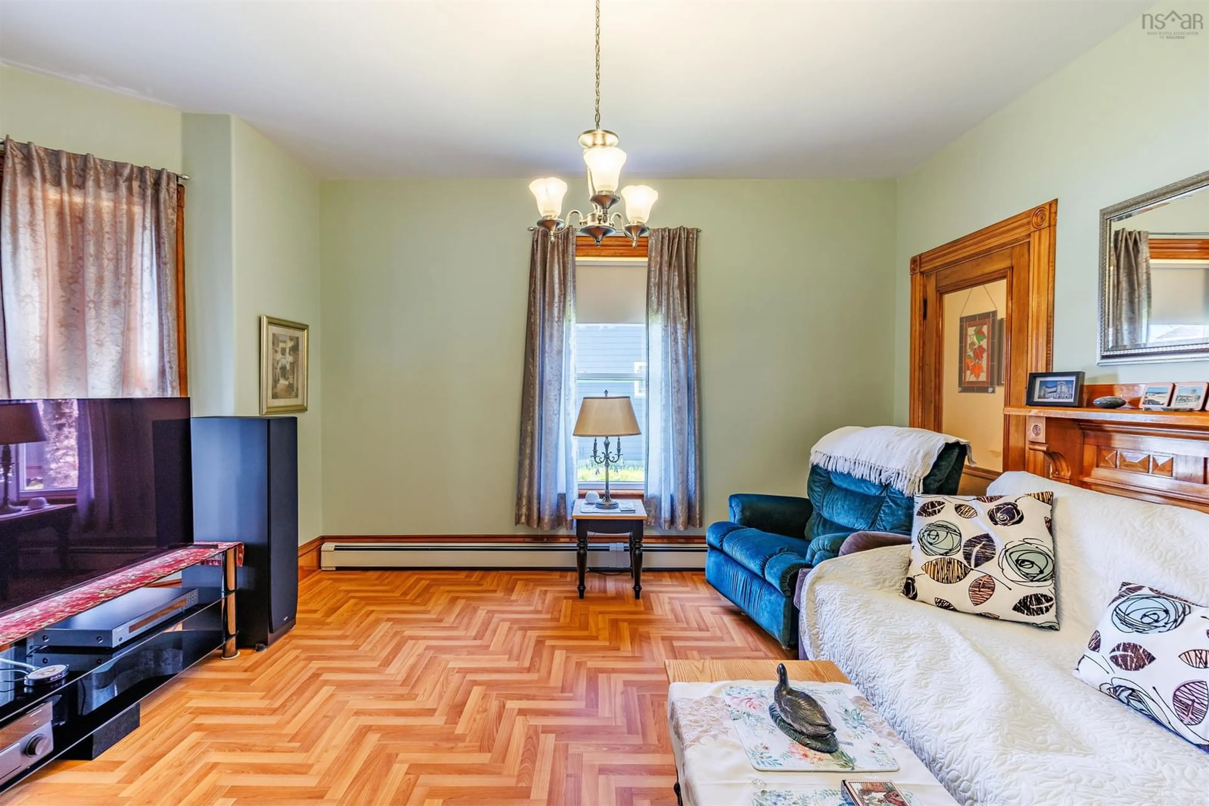 Living room with furniture, unknown for 26 King St, Yarmouth Nova Scotia B5A 2X8