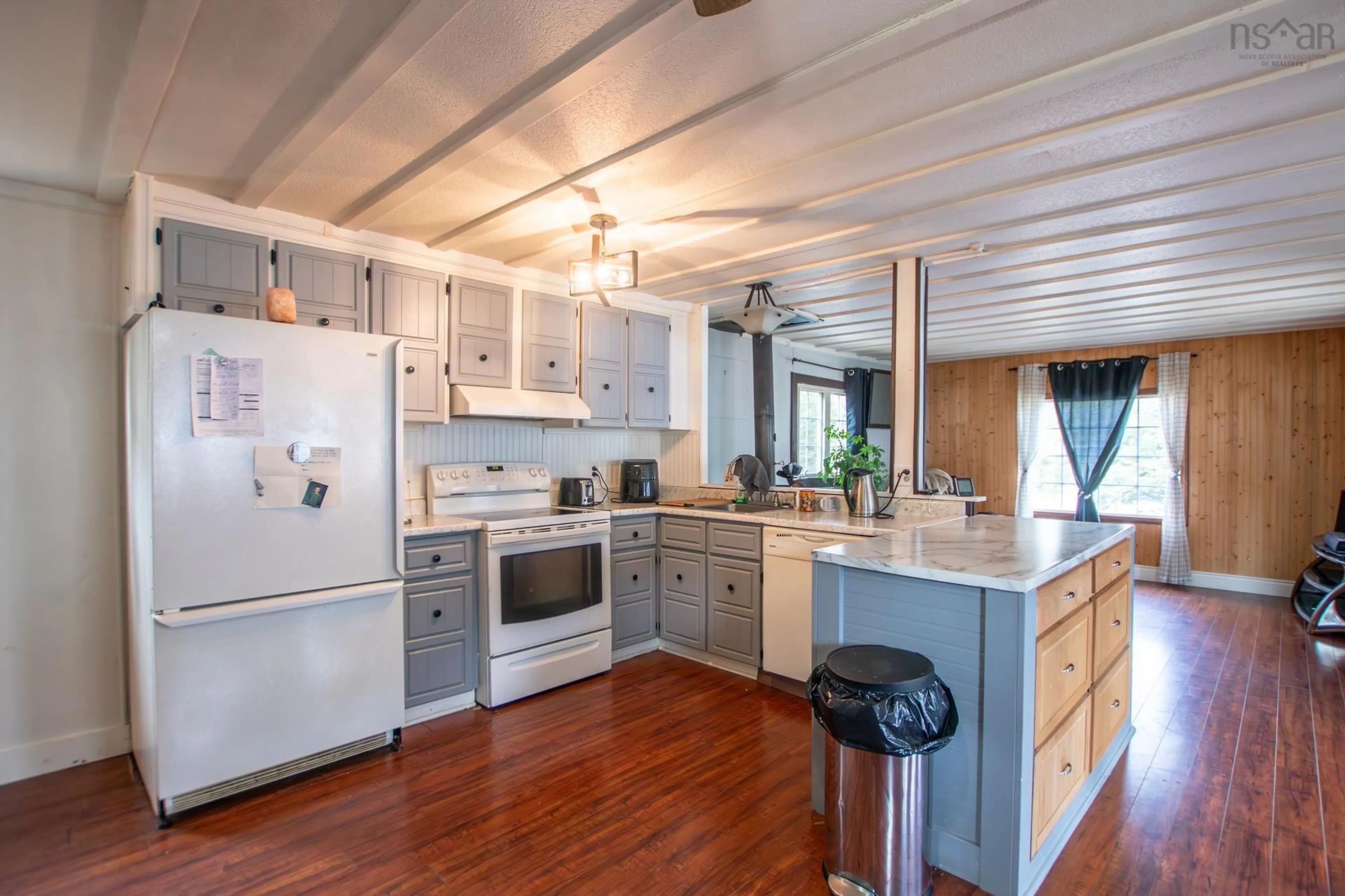 Open concept kitchen, wood/laminate floor for 193 Ostrea Lake Rd, Ostrea Lake Nova Scotia B0J 2L0