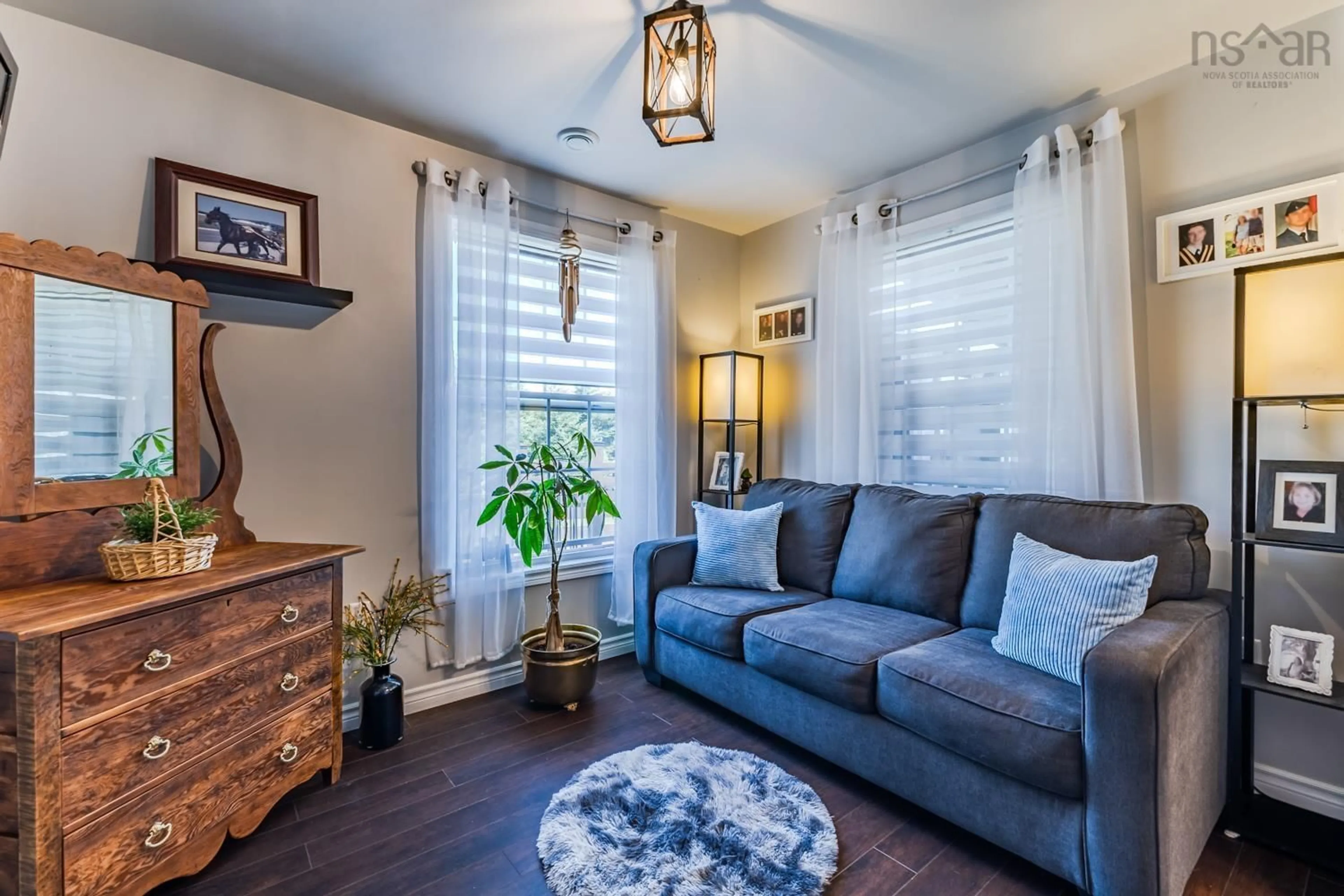 Living room with furniture, wood/laminate floor for 1923 Fox Harbour Rd, Fox Harbour Nova Scotia B0K 1Y0