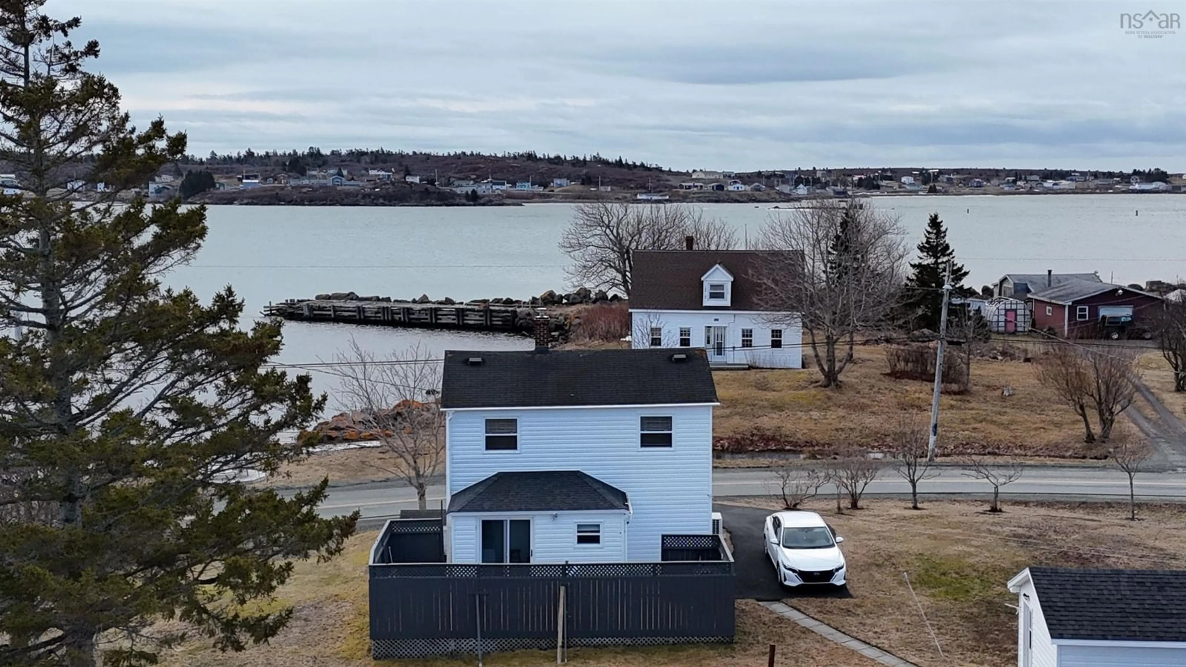 A pic from outside/outdoor area/front of a property/back of a property/a pic from drone, water/lake/river/ocean view for 198 Boudreauville Rd, Boudreauville Nova Scotia B0E 2L0