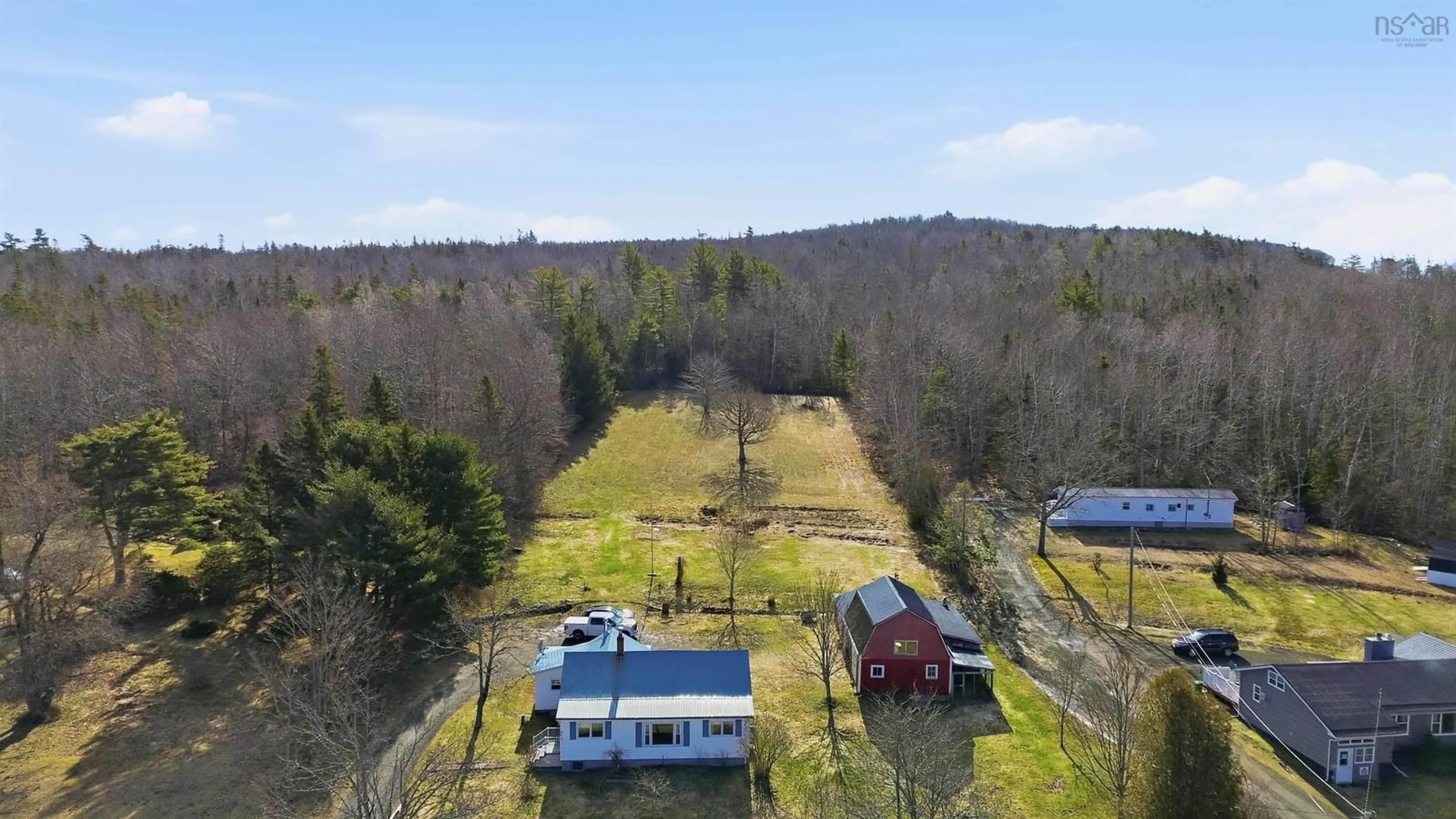 A pic from outside/outdoor area/front of a property/back of a property/a pic from drone, forest/trees view for 272 Highway 201, Moschelle Nova Scotia B0S 1A0
