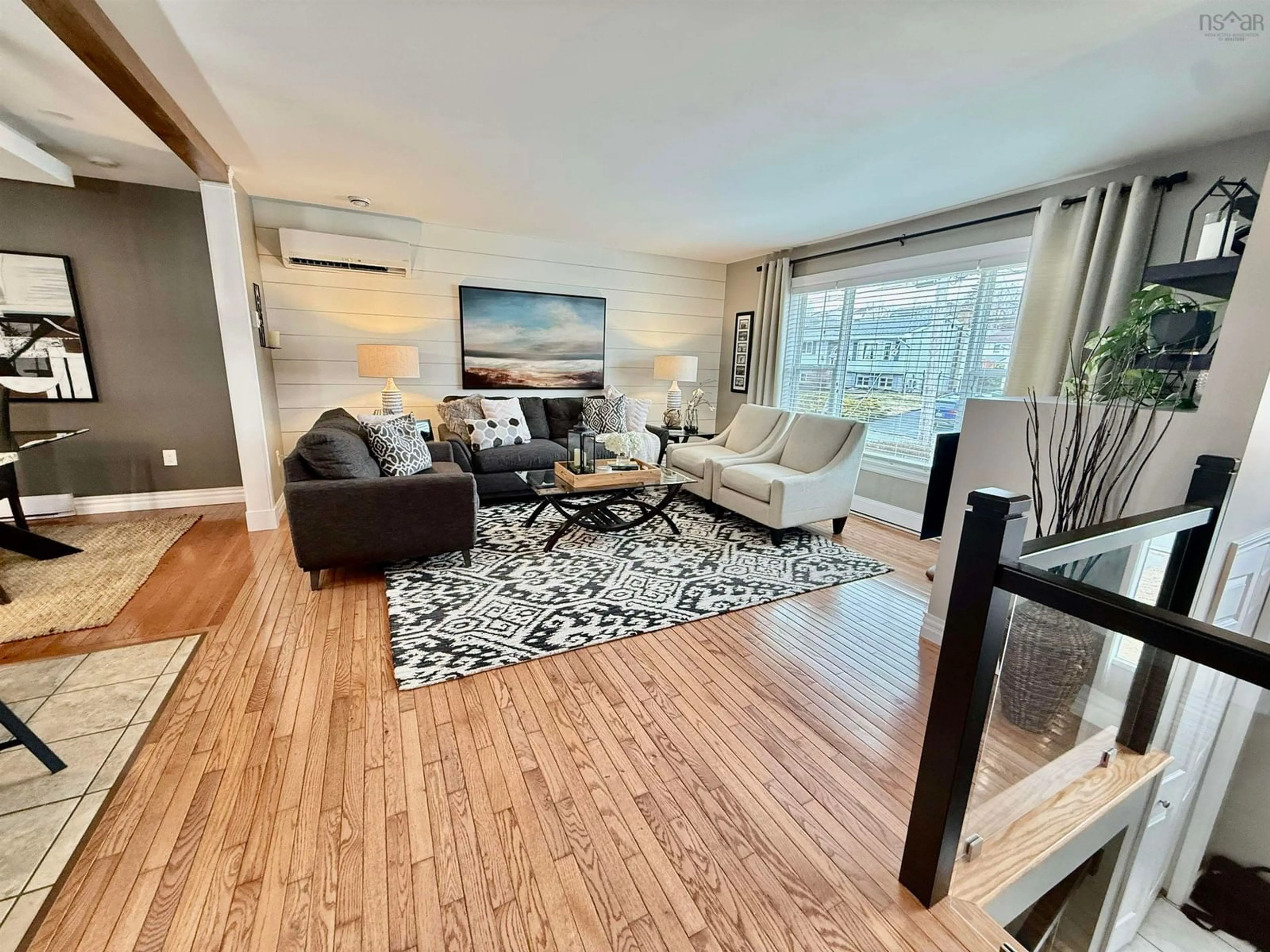 Living room with furniture, wood/laminate floor for 10 Trundle Cres, Middle Sackville Nova Scotia B4E 2X2