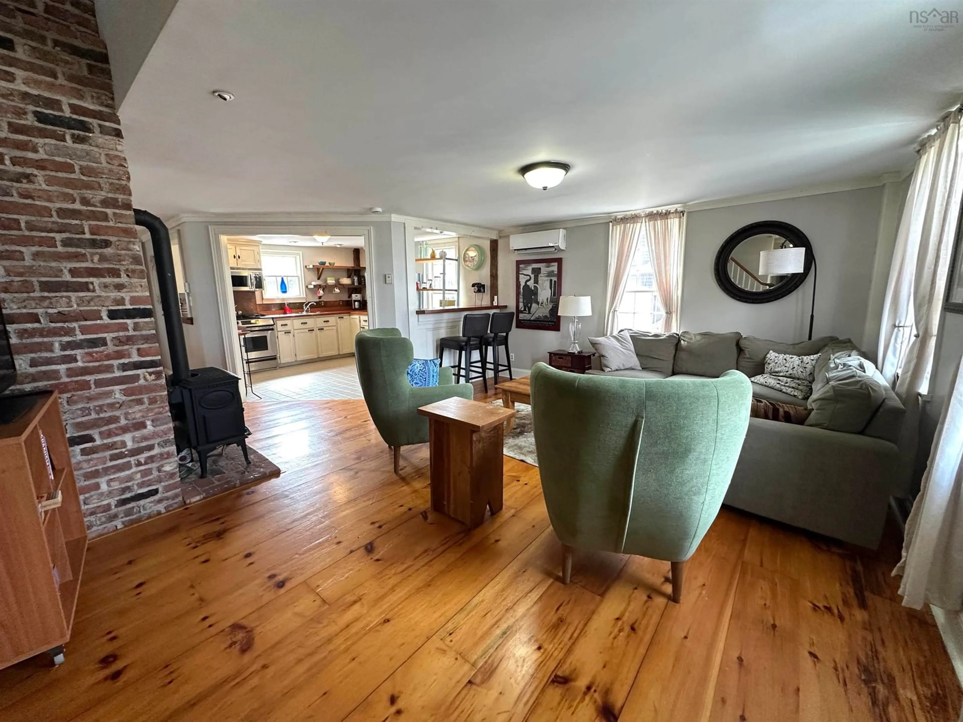 Living room with furniture, wood/laminate floor for 71 Main St, Liverpool Nova Scotia B0T 1K0