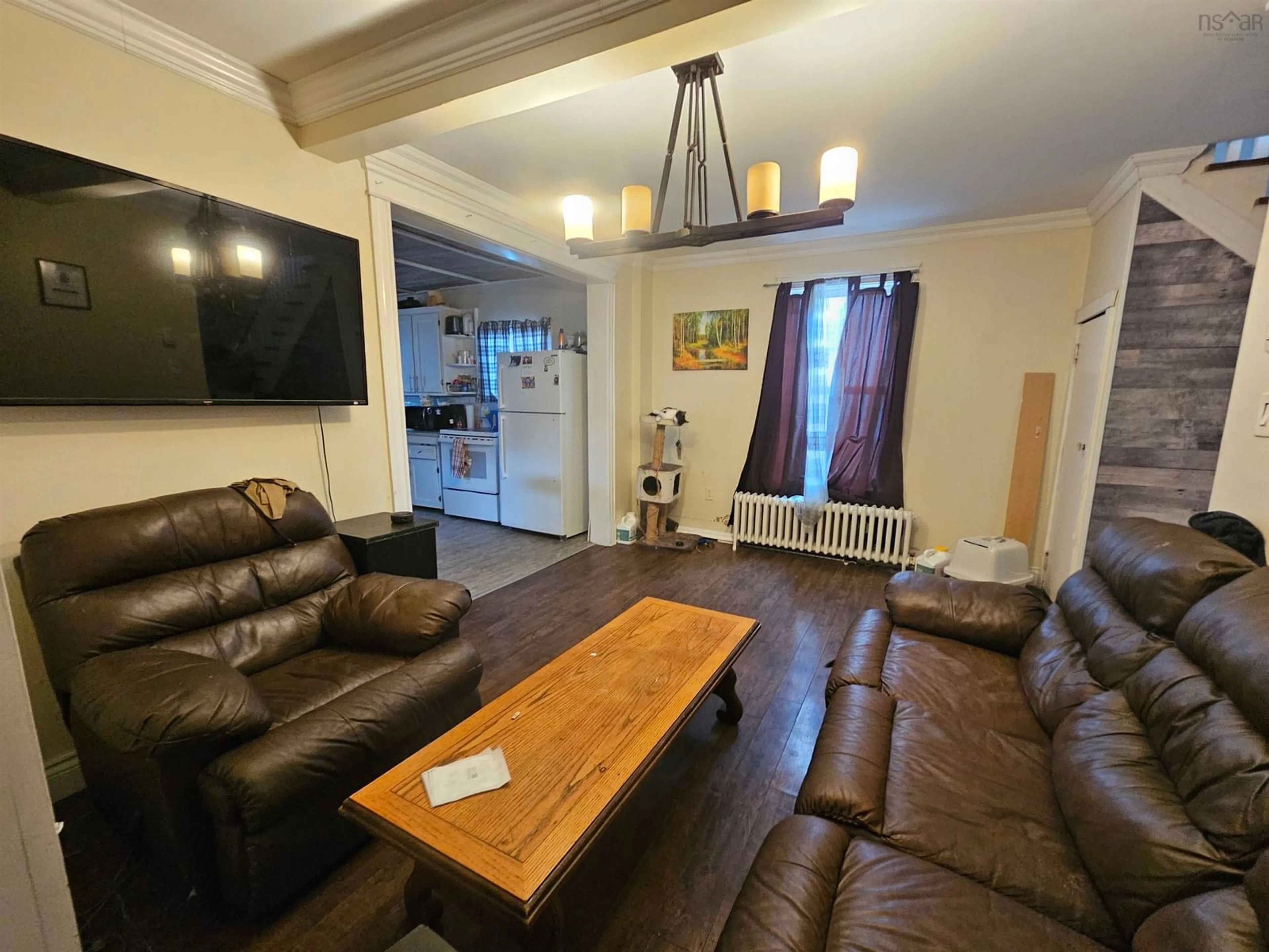 Living room with furniture, unknown for 26 Windsor Ave, Sydney Mines Nova Scotia B1Y 2J7