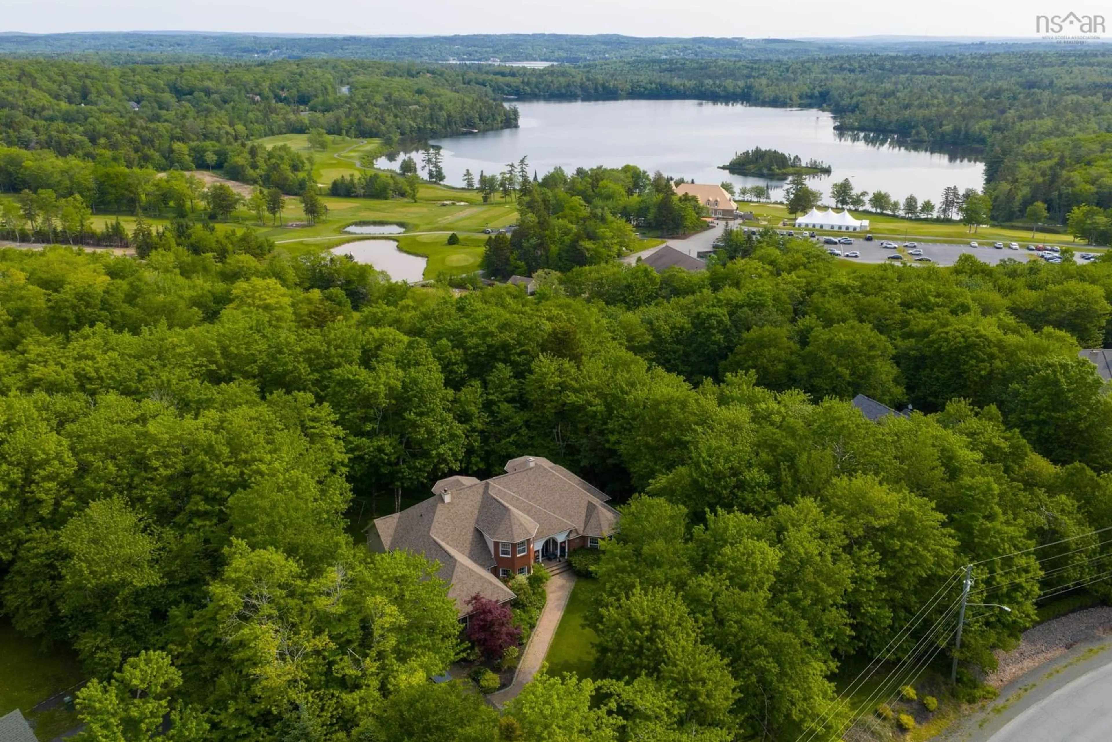 A pic from outside/outdoor area/front of a property/back of a property/a pic from drone, water/lake/river/ocean view for 14 Club House Lane, Hammonds Plains Nova Scotia B4B 1T4
