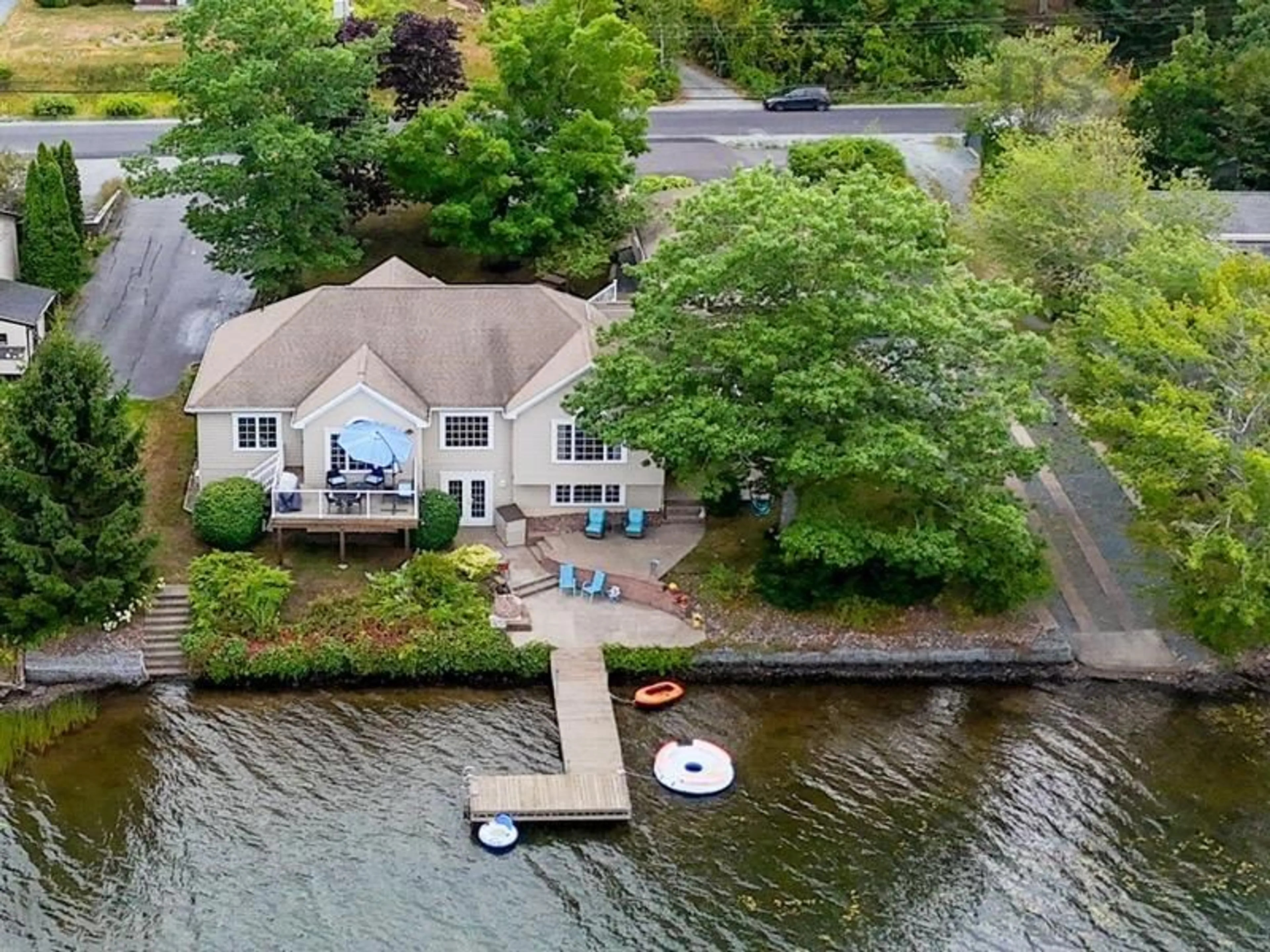A pic from outside/outdoor area/front of a property/back of a property/a pic from drone, water/lake/river/ocean view for 385 Lakeview Ave, Middle Sackville Nova Scotia B4E 3B6