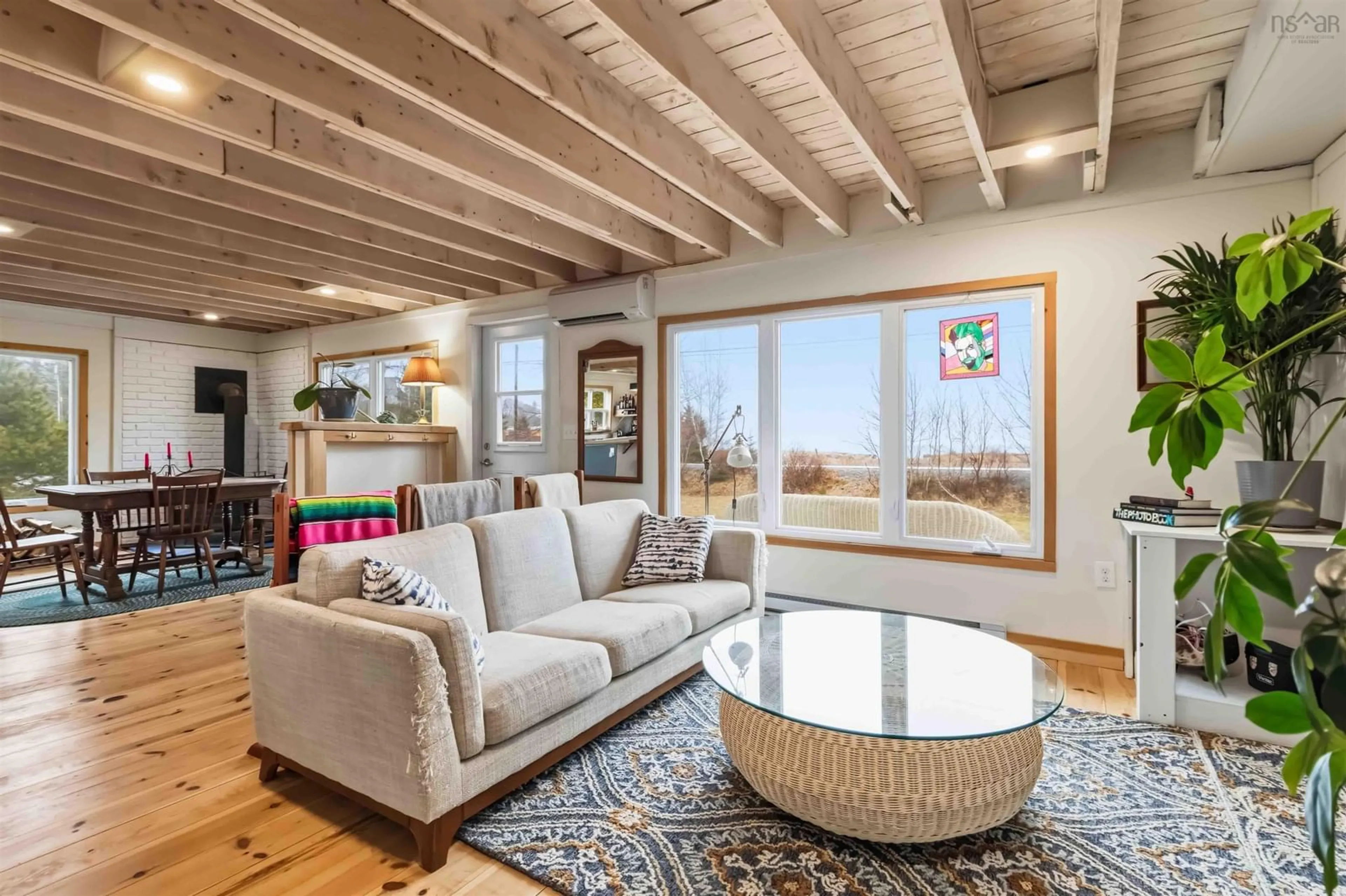 Living room with furniture, wood/laminate floor for 274 Masons Beach Rd, Masons Beach Nova Scotia B0J 2C0