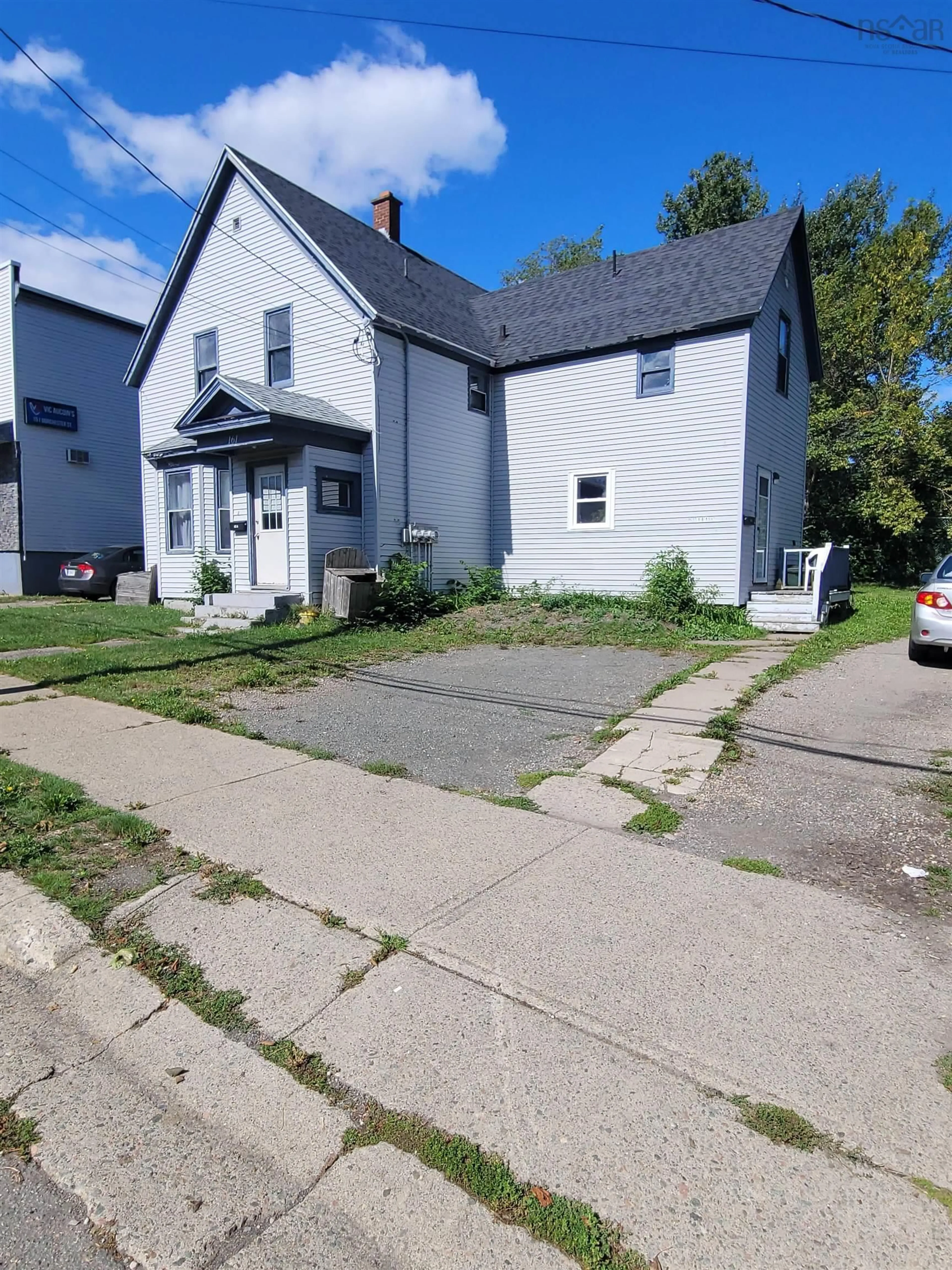 A pic from outside/outdoor area/front of a property/back of a property/a pic from drone, street for 161 Dorchester St, Sydney Nova Scotia B1P 5Z7