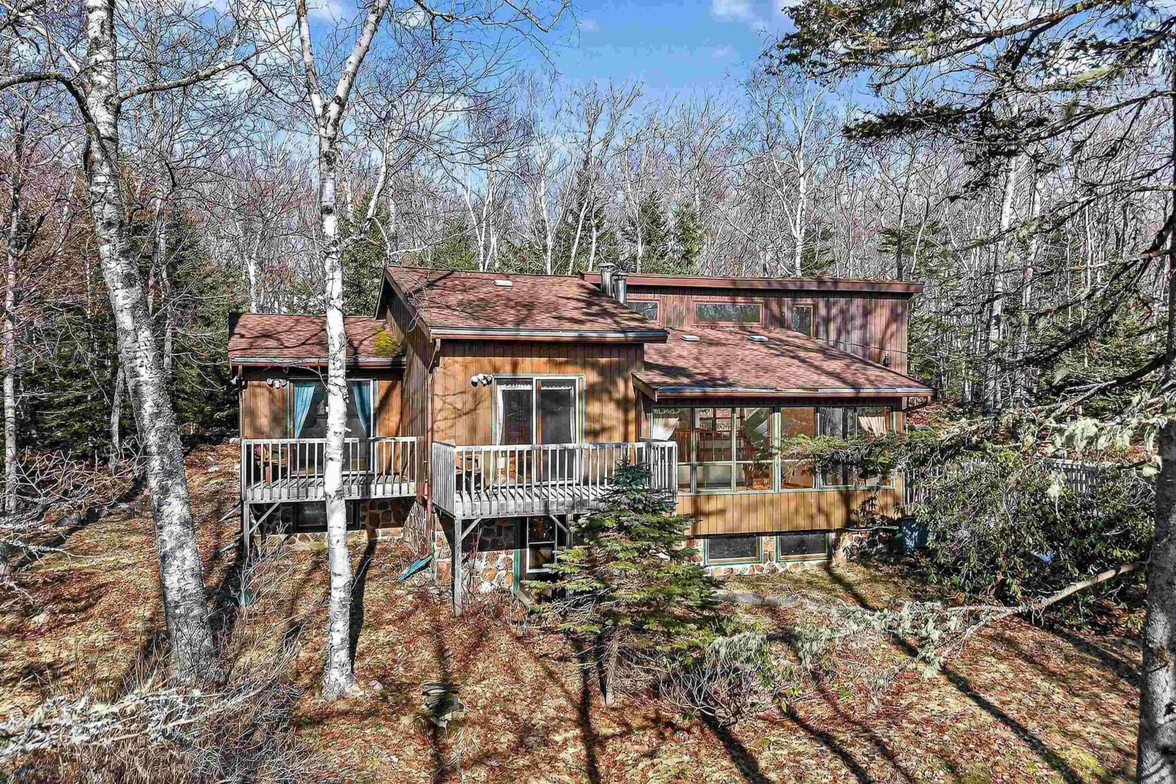 A pic from outside/outdoor area/front of a property/back of a property/a pic from drone, forest/trees view for 122 Windsor Dr, Stillwater Lake Nova Scotia B3Z 1G5