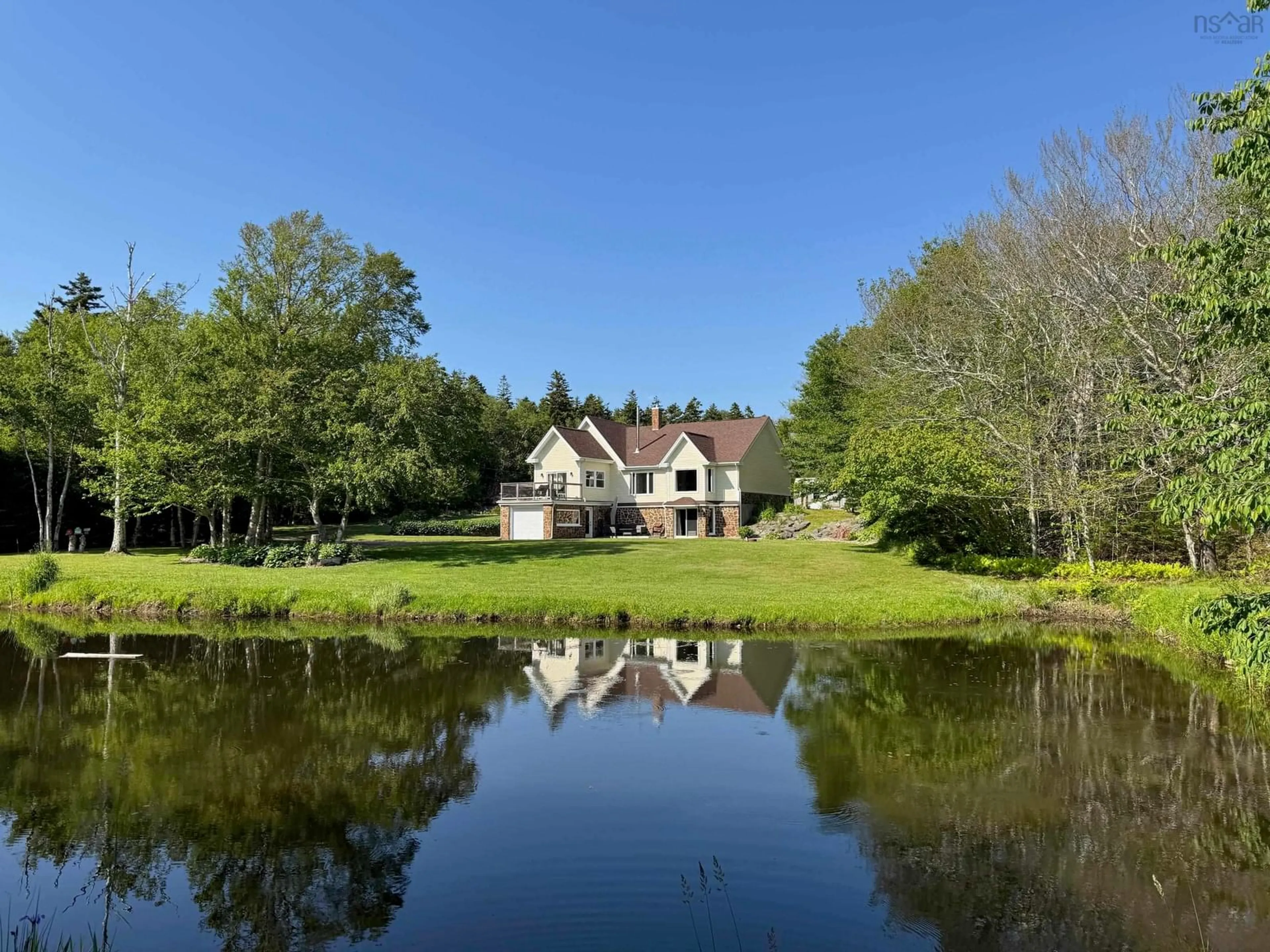 A pic from outside/outdoor area/front of a property/back of a property/a pic from drone, water/lake/river/ocean view for 559 P F Comeau Rd, Comeauville Nova Scotia B0W 1M0