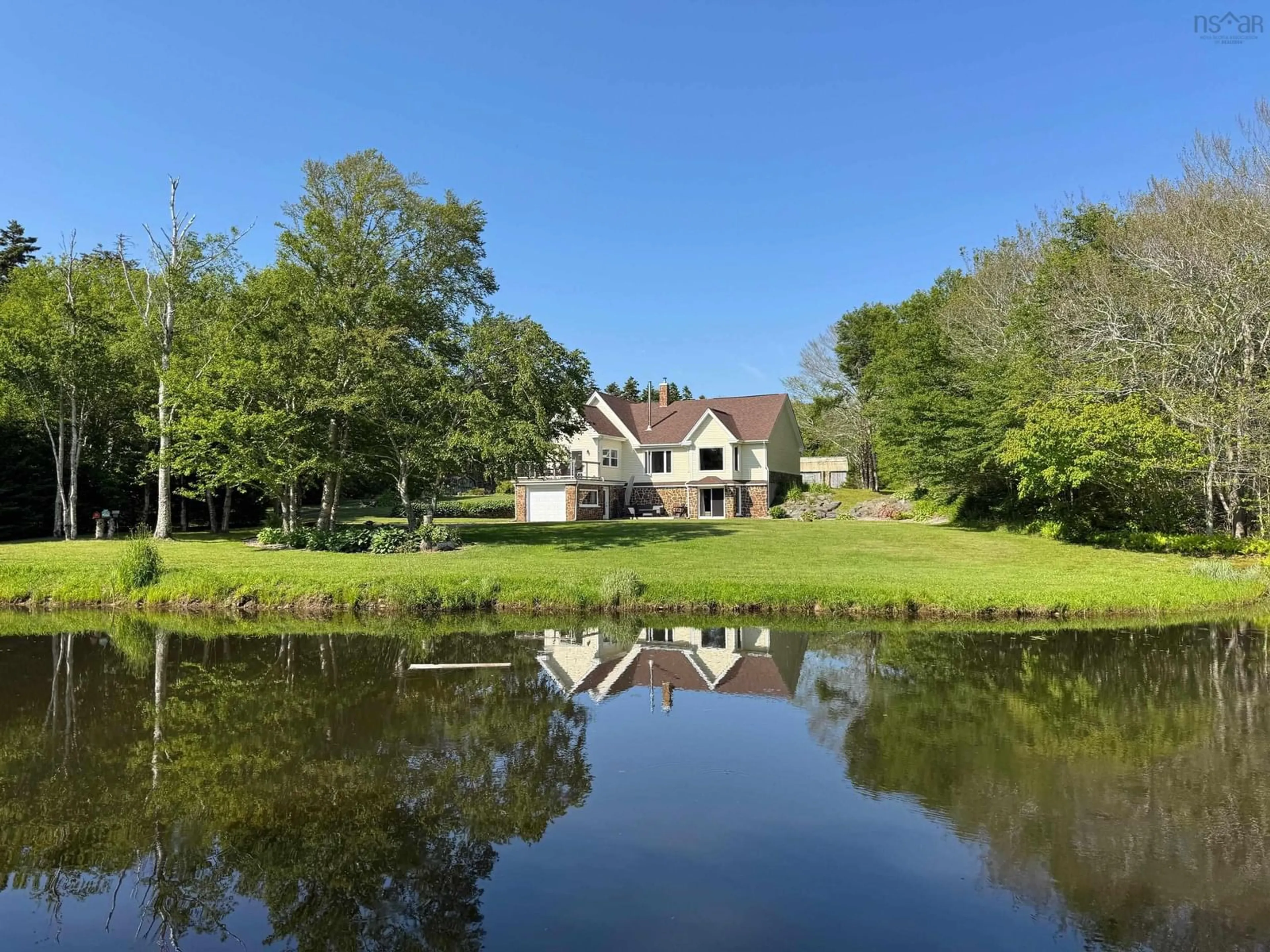 A pic from outside/outdoor area/front of a property/back of a property/a pic from drone, water/lake/river/ocean view for 559 P F Comeau Rd, Comeauville Nova Scotia B0W 1M0