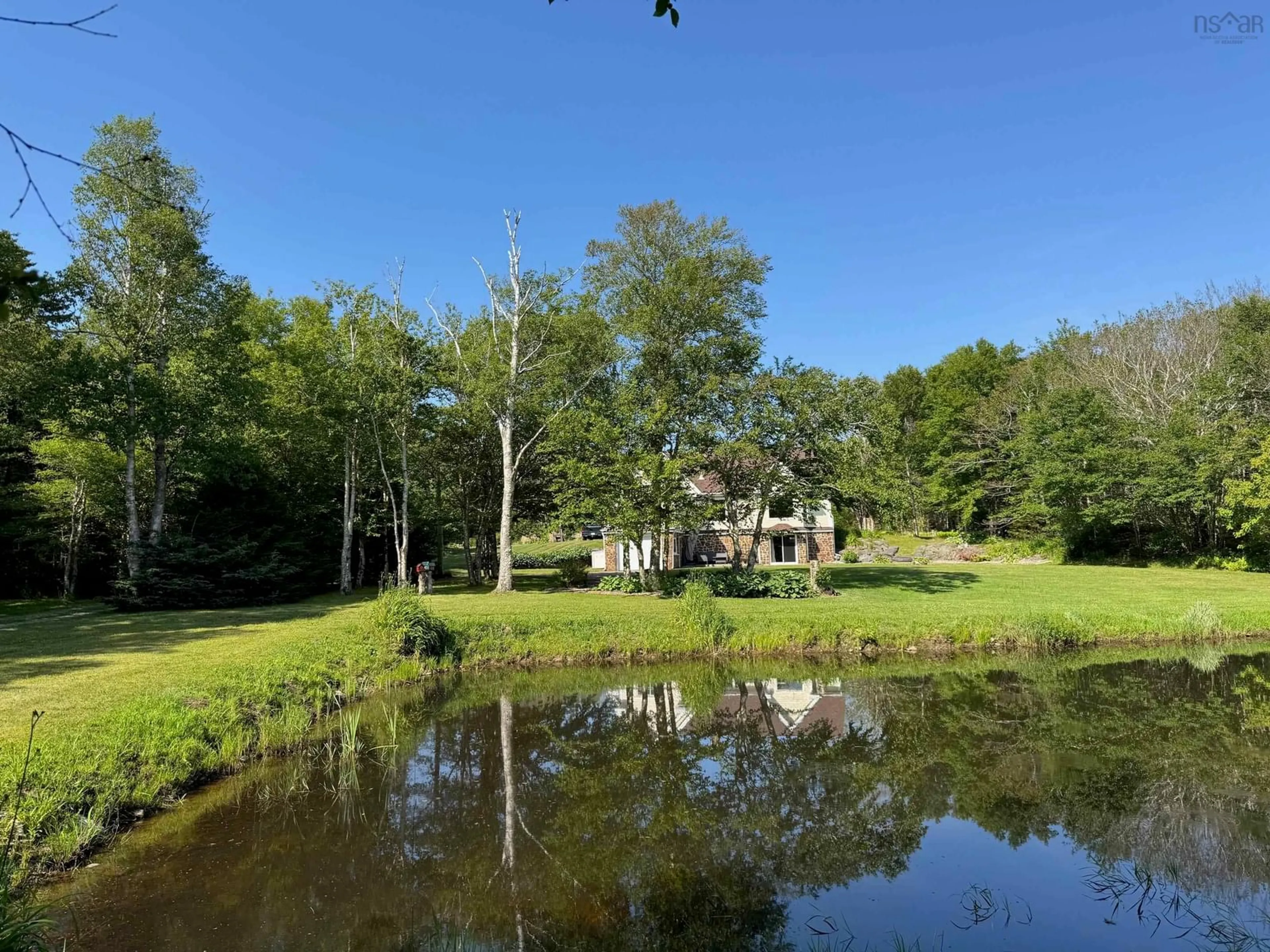 A pic from outside/outdoor area/front of a property/back of a property/a pic from drone, water/lake/river/ocean view for 559 P F Comeau Rd, Comeauville Nova Scotia B0W 1M0