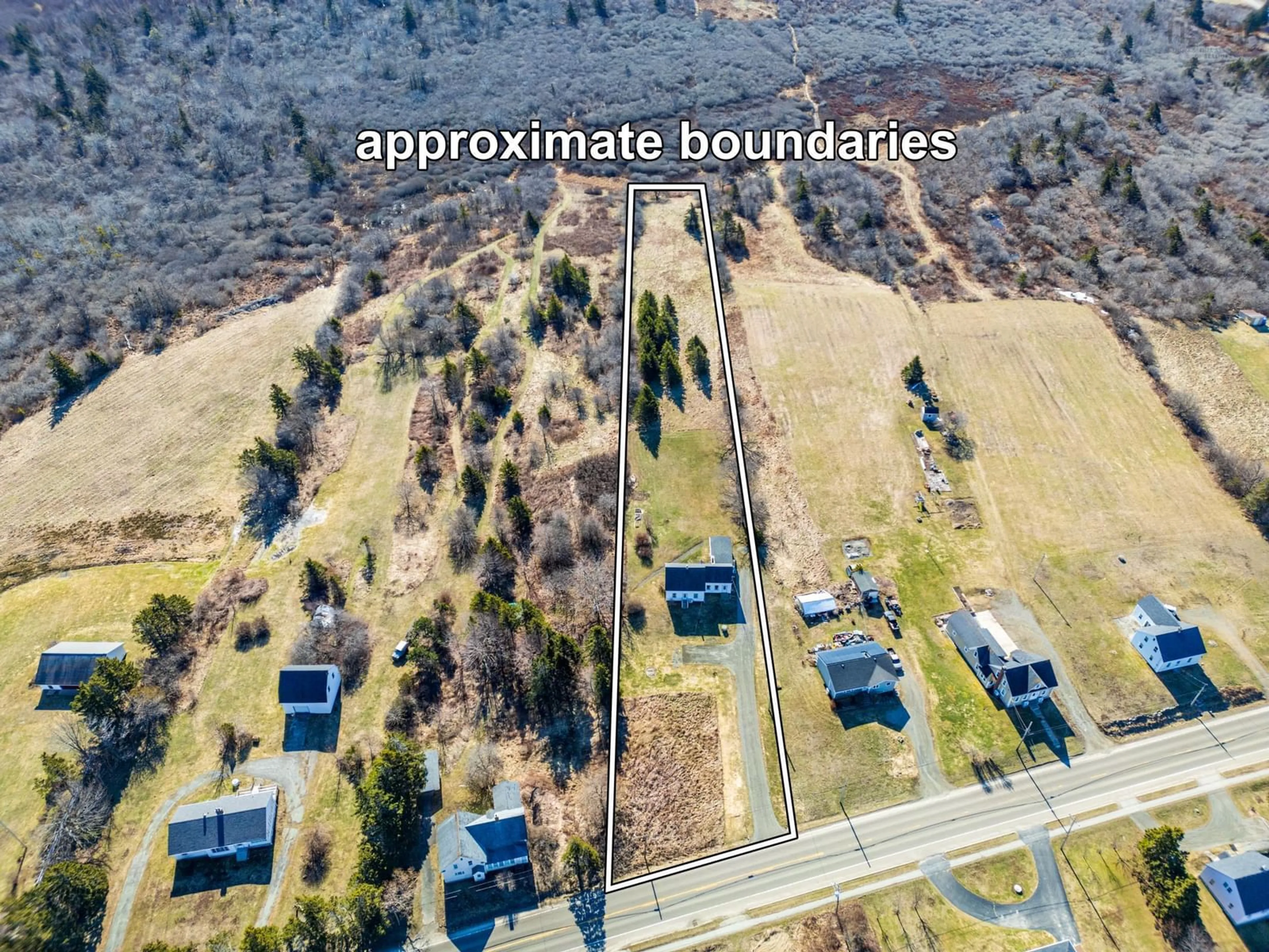 A pic from outside/outdoor area/front of a property/back of a property/a pic from drone, mountain view for 1900 Highway 1, Church Point Nova Scotia B0W 1M0