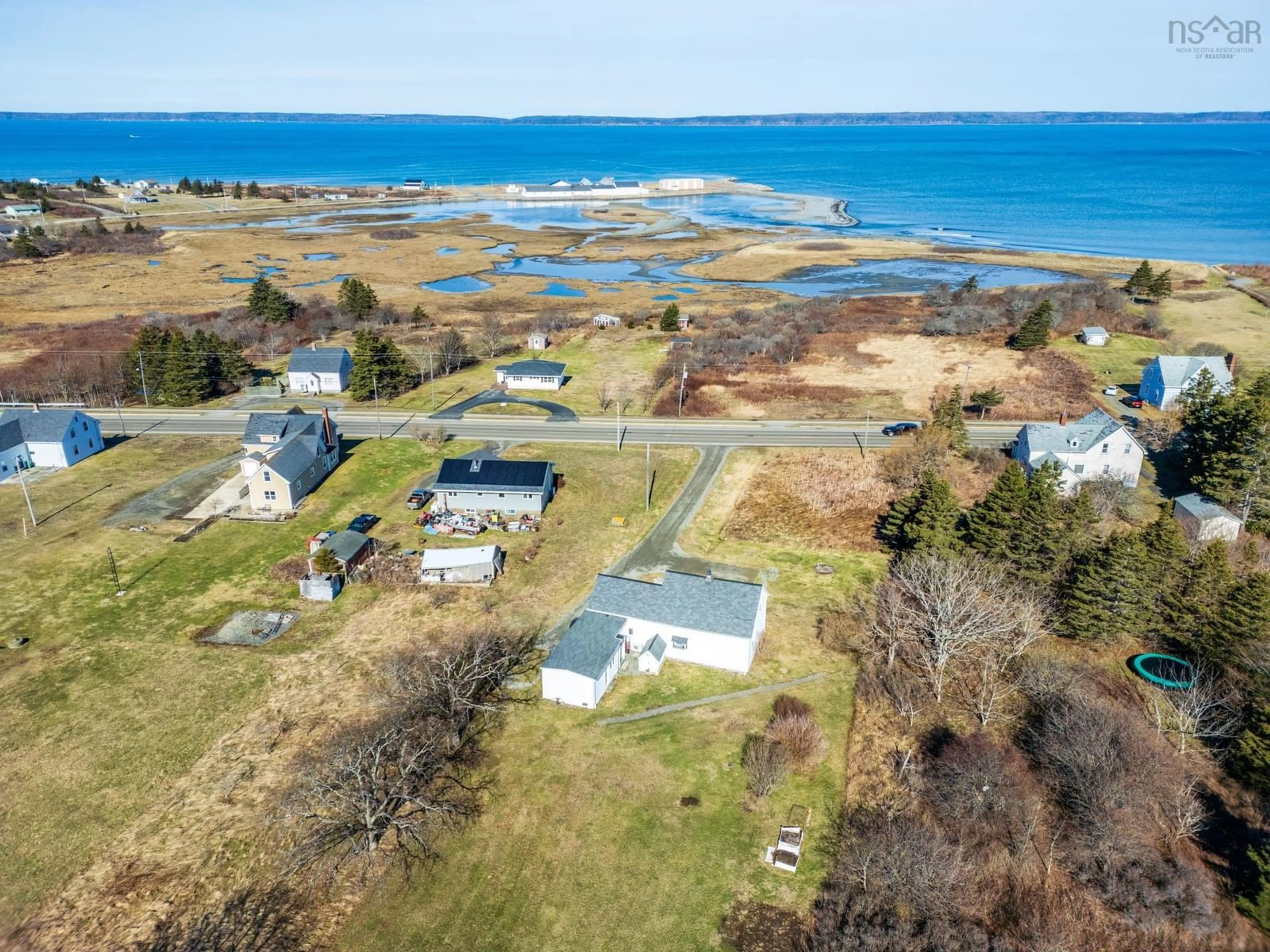 A pic from outside/outdoor area/front of a property/back of a property/a pic from drone, water/lake/river/ocean view for 1900 Highway 1, Church Point Nova Scotia B0W 1M0
