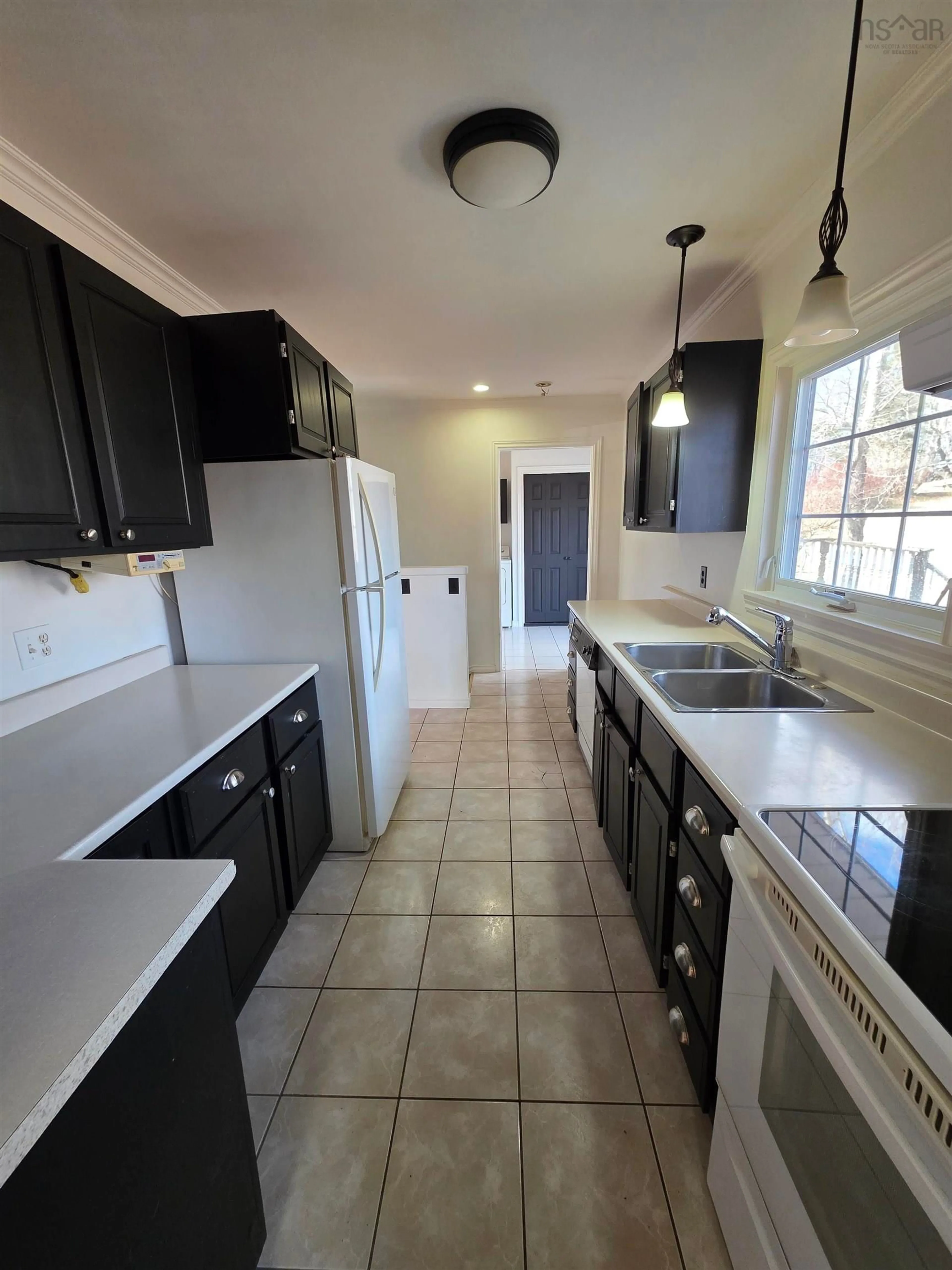 Open concept kitchen, ceramic/tile floor for 61 Mt Florence St, Coxheath Nova Scotia B1R 1T9