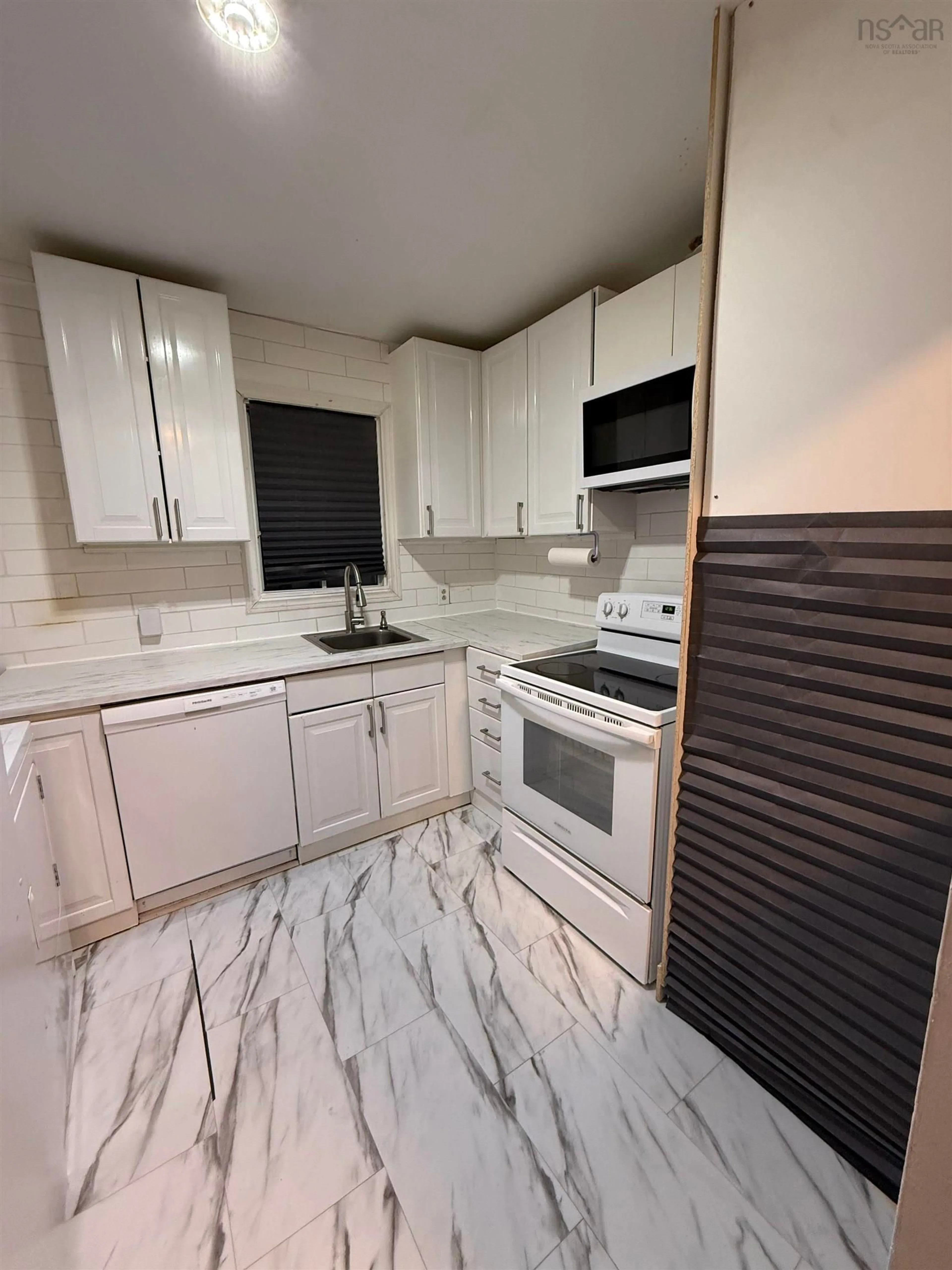 Standard kitchen, ceramic/tile floor for 15 Winona St, Glace Bay Nova Scotia B1A 2C3