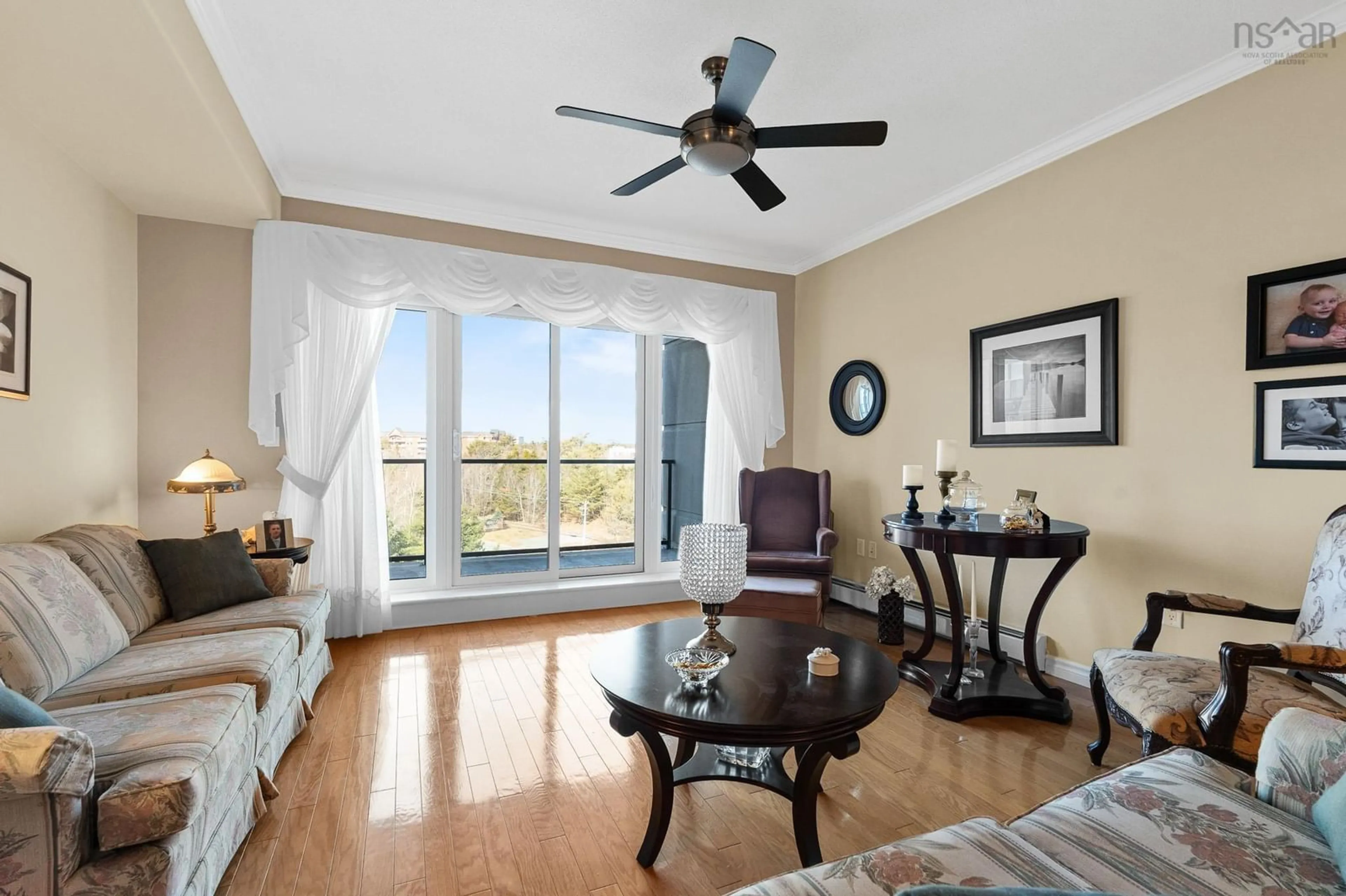 Living room with furniture, wood/laminate floor for 36 Southgate Dr #407, Bedford Nova Scotia B4A 4M4