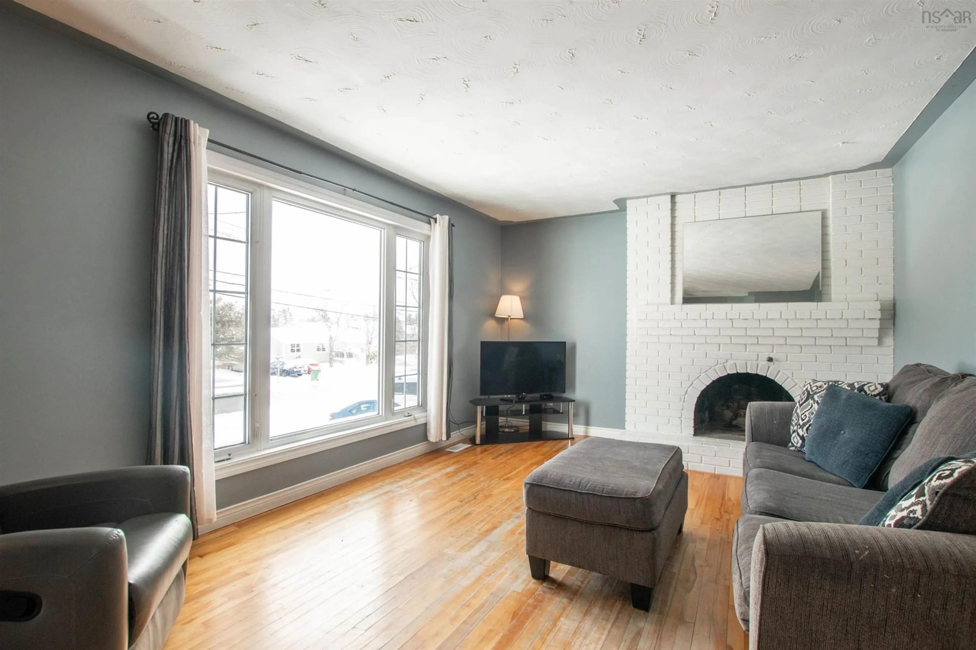 Living room with furniture, wood/laminate floor for 309 Astral Dr, Cole Harbour Nova Scotia B2V 1B7