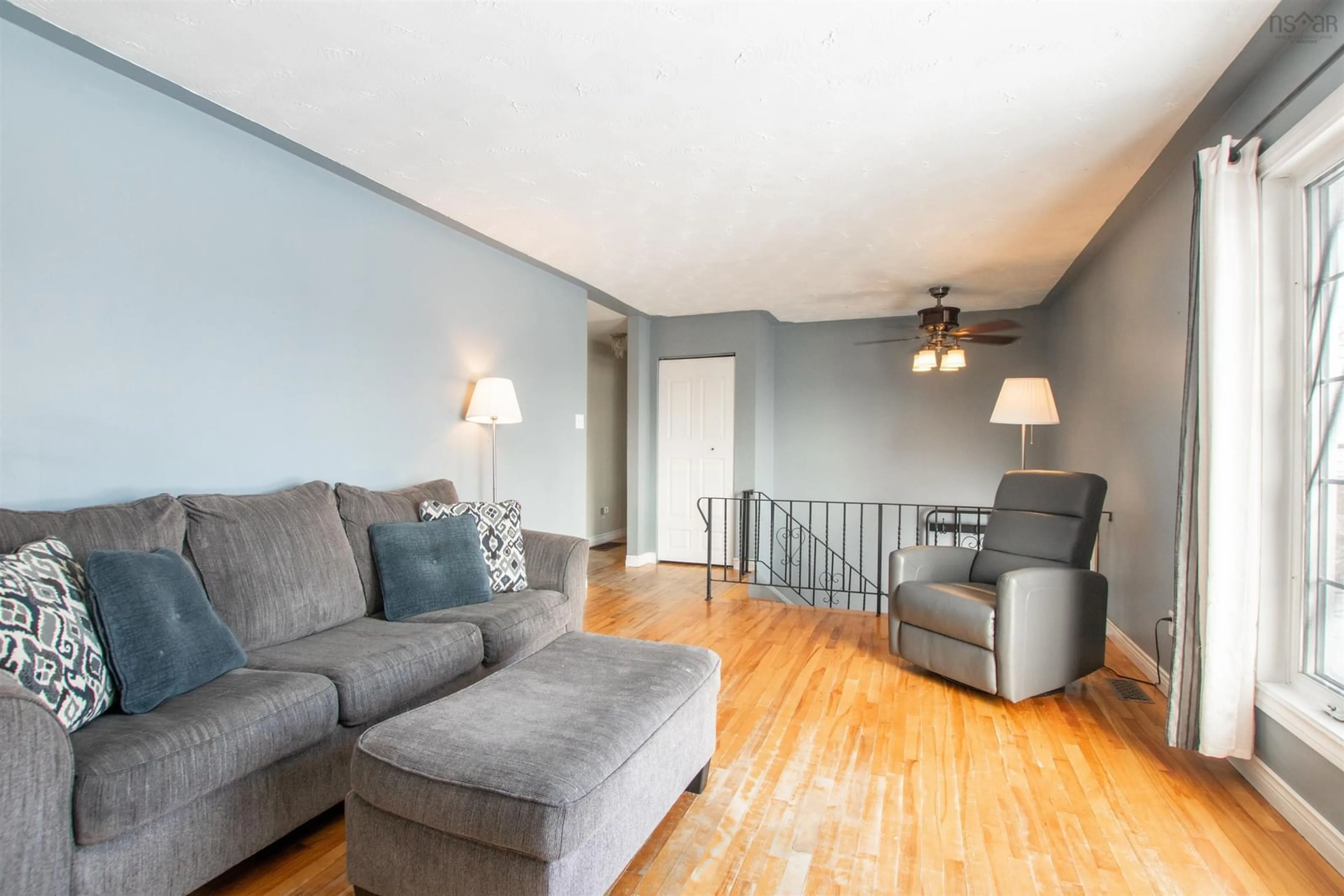 Living room with furniture, wood/laminate floor for 309 Astral Dr, Cole Harbour Nova Scotia B2V 1B7