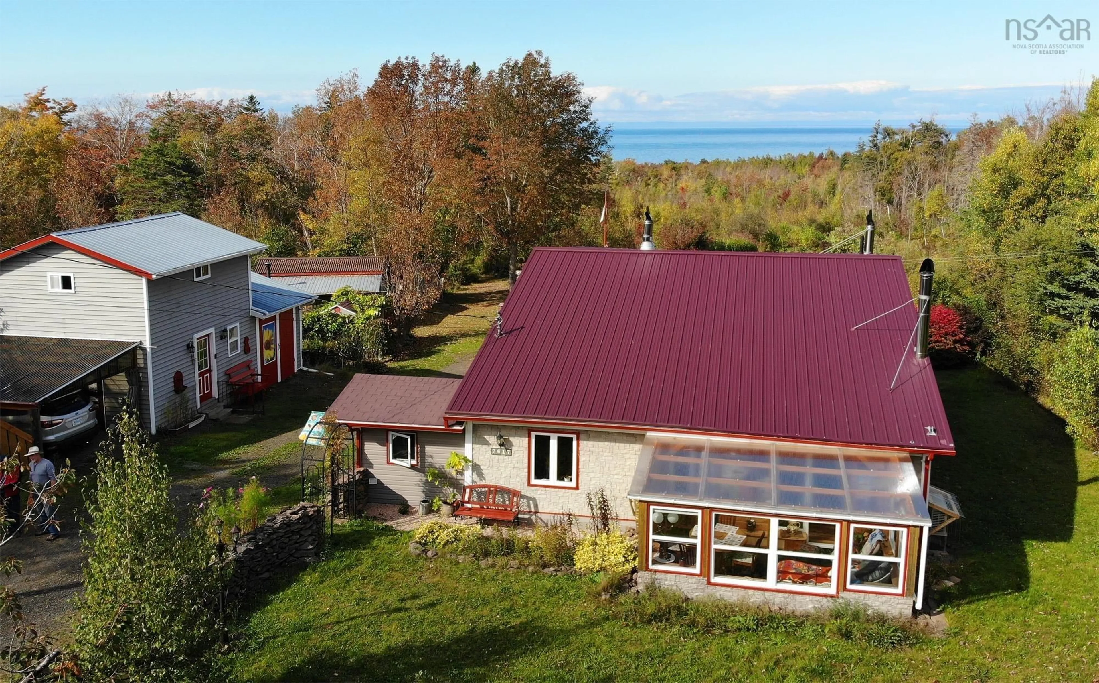 A pic from outside/outdoor area/front of a property/back of a property/a pic from drone, water/lake/river/ocean view for 7617 Shore Rd, Hampton Nova Scotia B0S 1L0
