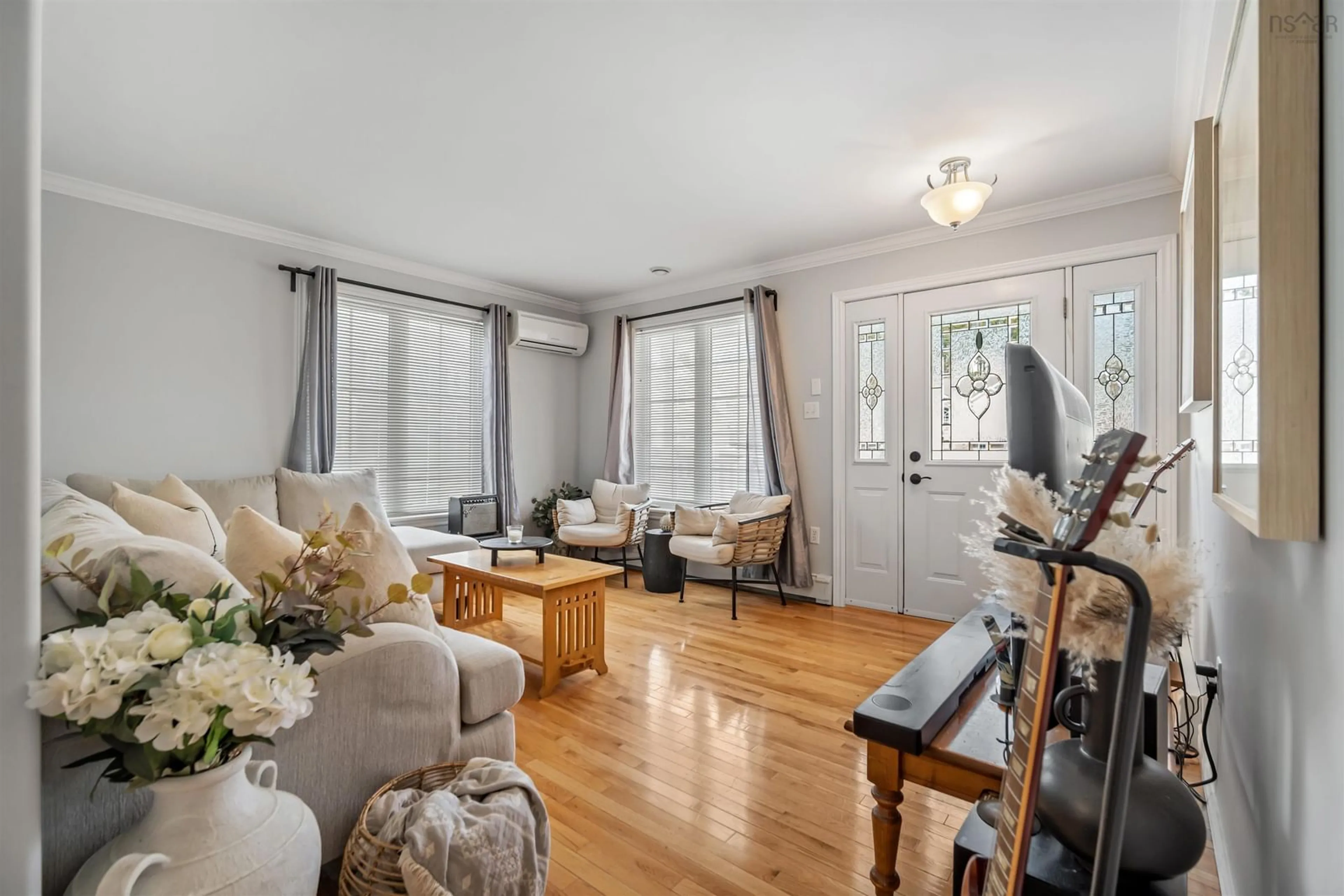 Living room with furniture, wood/laminate floor for 28 Feller Crt, Middle Sackville Nova Scotia B4E 3M4
