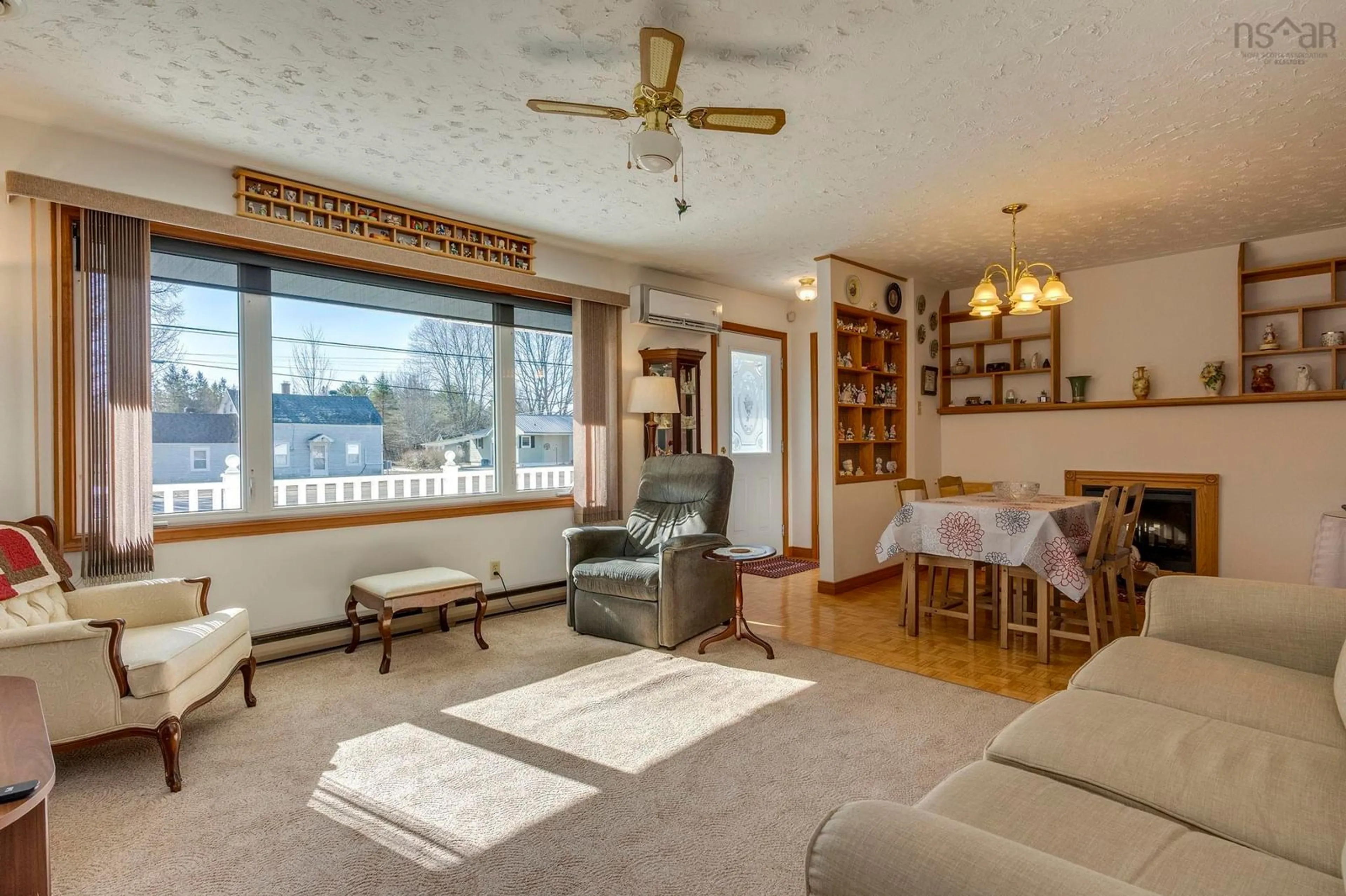 Living room with furniture, wood/laminate floor for 8711 201 Hwy, Nictaux Nova Scotia B0S 1P0