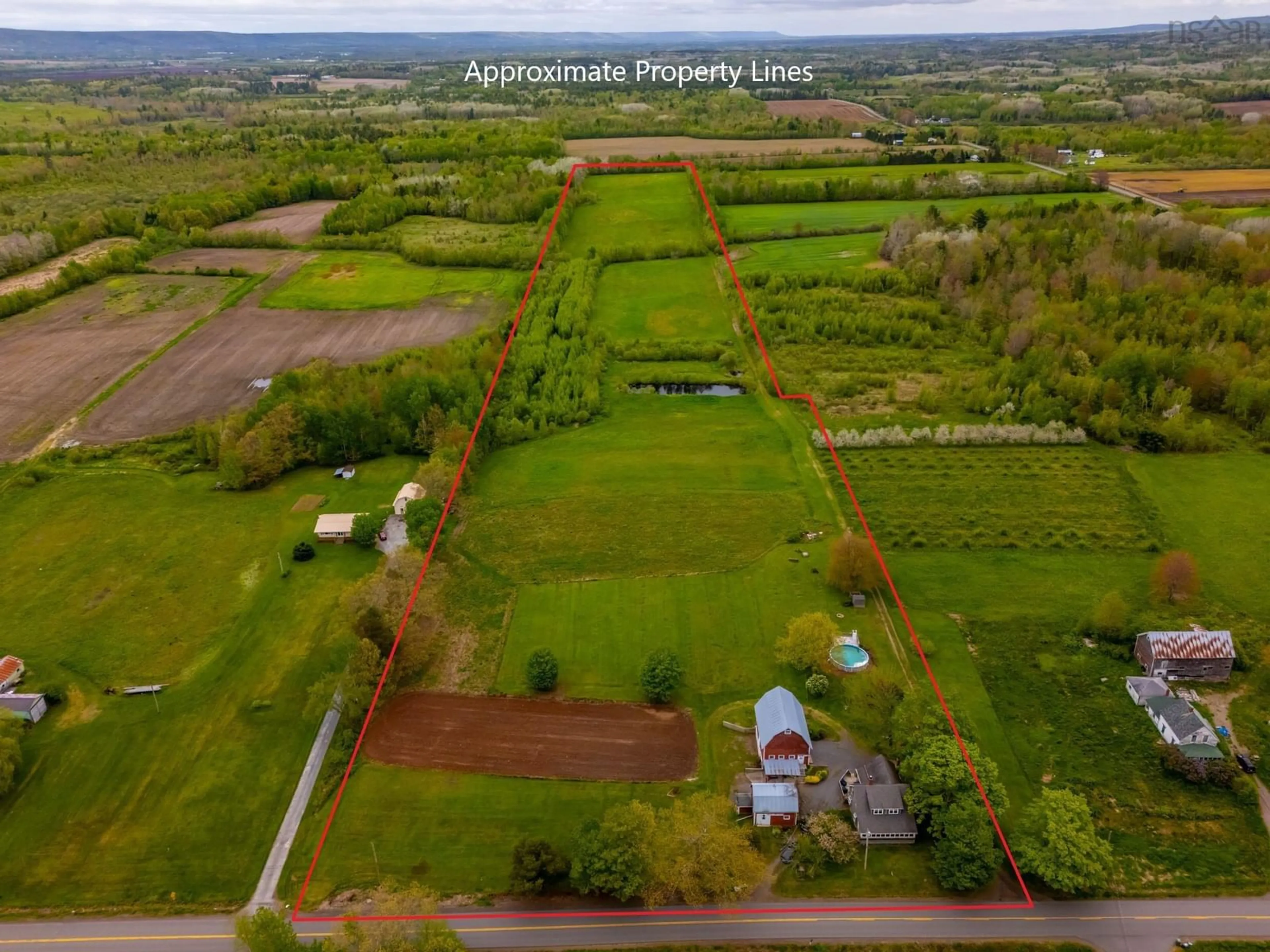 A pic from outside/outdoor area/front of a property/back of a property/a pic from drone, unknown for 6994 Aylesford Rd, Factorydale Nova Scotia B0P 1C0